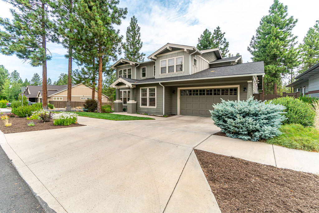 Welcome to your new home amongst the trees in Shevlin Pines! This 4 bedroom and 4-car garage (920sf) home offers space for everyone. The main level has a private office and guest bedroom with an attached bathroom. Open concept living that so many desire allows for easy entertaining between the kitchen, dining and great room. Relax and unwind on the paver patio next to the gas fire pit and calming water feature. Upstairs you will find the primary suite with a large walk-in tile shower and soaking tub. Two guest bedrooms, a guest bathroom and an oversized bonus room finish off the second level. Don't be deceived by the garage door! It's extra deep and can accommodate 4 cars if needed or use the space for your home gym. Shevlin Pines is in a perfect location for the outdoor enthusiast. You'll find easy access to arguably Bend's finest trail systems right across the street at Shevlin Park. Not only that, it's a short distance to the downtown and NWX amenities, shops, and restaurants.