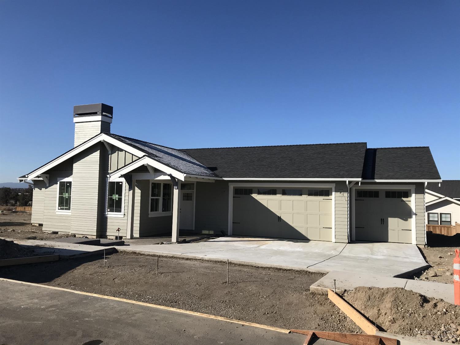 3 Car Garage, air conditioning and beautiful Mountain Views are highlighted in this lovely craftsman home by Palmer Homes. Completion on this 2167 sq ft single story home on a large home site is set for late March. Luxury finishes throughout including: quartz counters in the gourmet kitchen with prep sink in island, oversized pantry, large walk-in closet, walk-in tile shower, large master bath vanity and more. Redtail Ridge in SW Redmond has gorgeous mountain views protected by height restrictions in the CCR's.