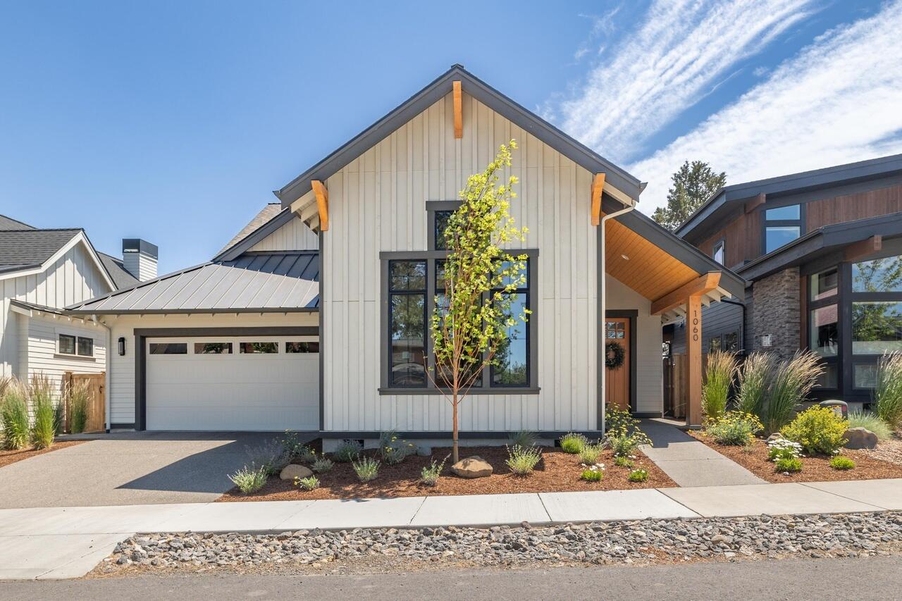 Discover this Modern Farmhouse Retreat in Sisters, Oregon. Built in 2021 by Curtis Homes, this 1,800 sq. ft. energy-efficient home offers 3 beds, 2 baths, and an open-concept layout with quality finishes throughout. Enjoy a sun-filled great room with vaulted ceilings, stone gas fireplace, and custom workstations. The kitchen features quartz counters, stainless appliances, and ceiling-height cabinetry. The primary suite offers a walk-in closet, spa-style shower, and private deck access. Step outside to your backyard oasis with lush turf, gas fire pit, flower gardens, water feature, and built-in seating — perfect for year-round entertaining. Located near forest trails, parks, coffee shops, live music, dining, and vibrant downtown Sisters. A rare find in a sought-after neighborhood — don't miss this opportunity! Schedule your private tour today.