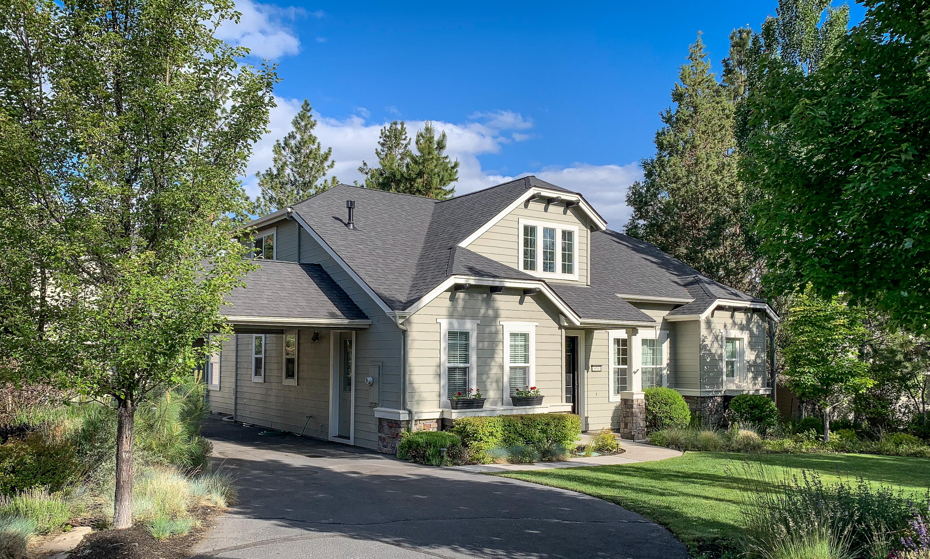 Imagine yourself living in ''The Parks,'' one of Bend's most desirable west side neighborhoods, where you can enjoy all of Bend's outdoor beauty without having to leave your home. 3ft high fencing allowed at this lot, Contact HOA mgr. for more details. This 1/3 ac. plus beautiful 4 bedroom, 2.5 bath, 2810 SF home with master on the main level, looks out to a spacious backyard perfect for yard games & relaxing in the hot tub. Private patio & upstairs deck are available for BBQs with family & friends during Bend's exquisite summer evenings. Separate detached 325 SF studio apartment with kitchen opens up to a large deck where you can enjoy your morning coffee nestled in the pine trees with peek a boo Cascade views overlooking Tetherow. No need to rent extra storage as this property includes an additional 500 SF garage perfect for a workshop, boats and recreational equipment. Additional parking is included to allow for up to 5 vehicles. Home backs to Tetherow buffer area