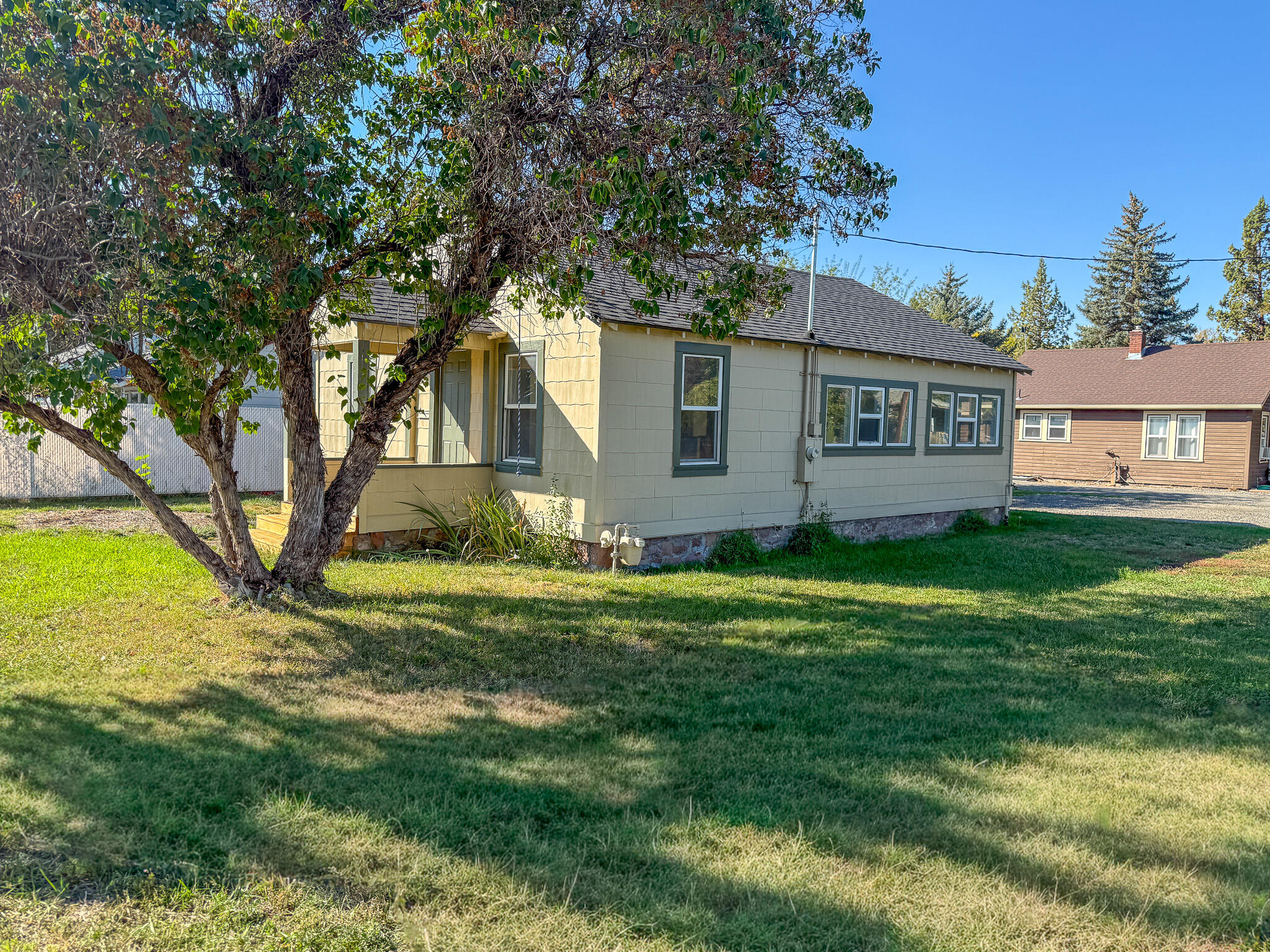 Adorable and move-in ready, this 2-bedroom, 1-bath home sits on a corner lot in the heart of Prineville, just a short distance from parks, shopping, and walking/biking paths. Recent updates include new interior and exterior paint, new flooring throughout, new kitchen cabinets, updated vinyl windows, and a completely refreshed bathroom. With charm and character in every detail, this property is an excellent choice for a first-time buyer, investment property, or a great little Airbnb.