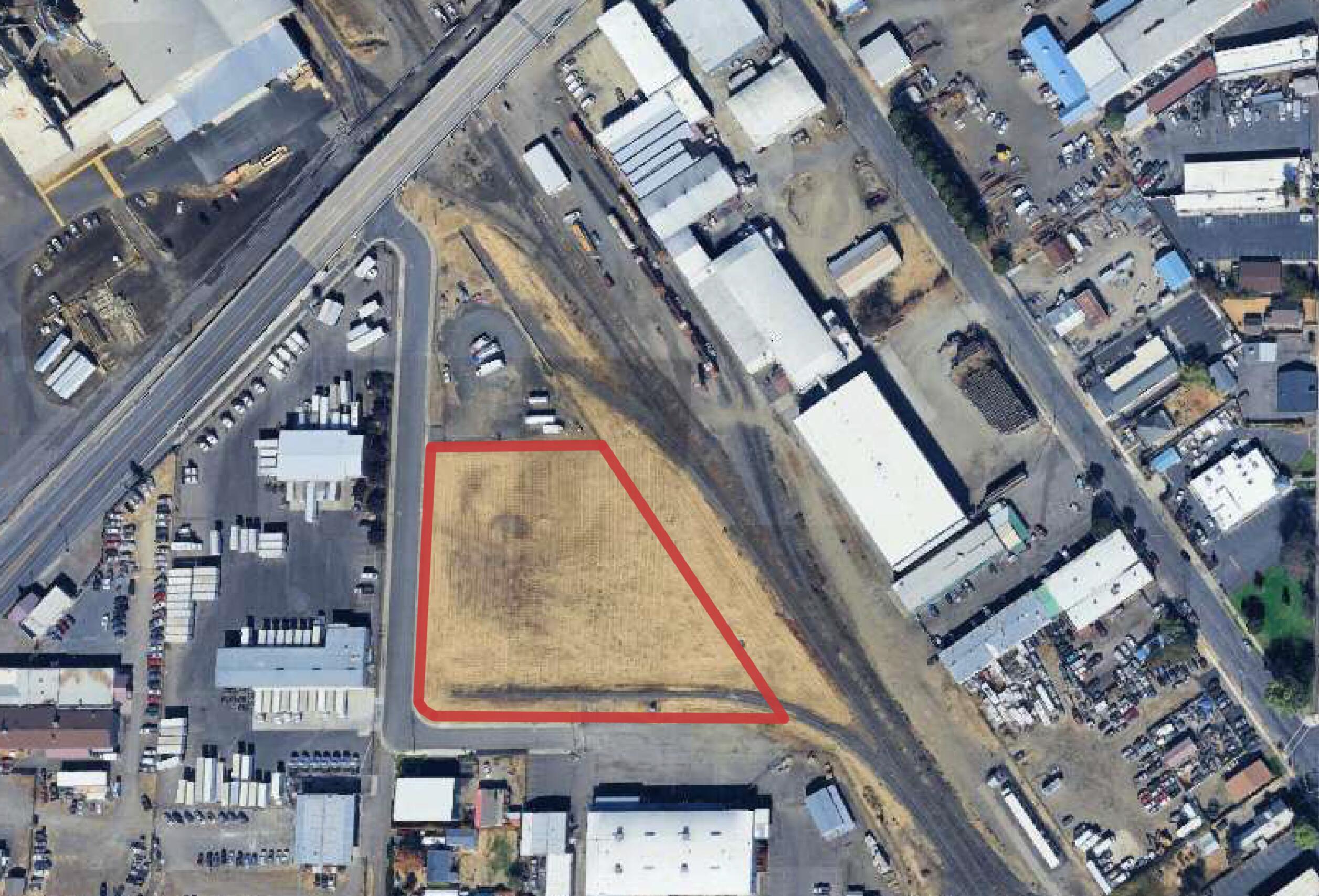 Light Industrial zoned vacant land available centrally located in Medford, OR. Former Union Pacific site with rail access available via the rail spur located on the South end of the lot. Property is comprised of two level tax lots totaling 2.66AC.