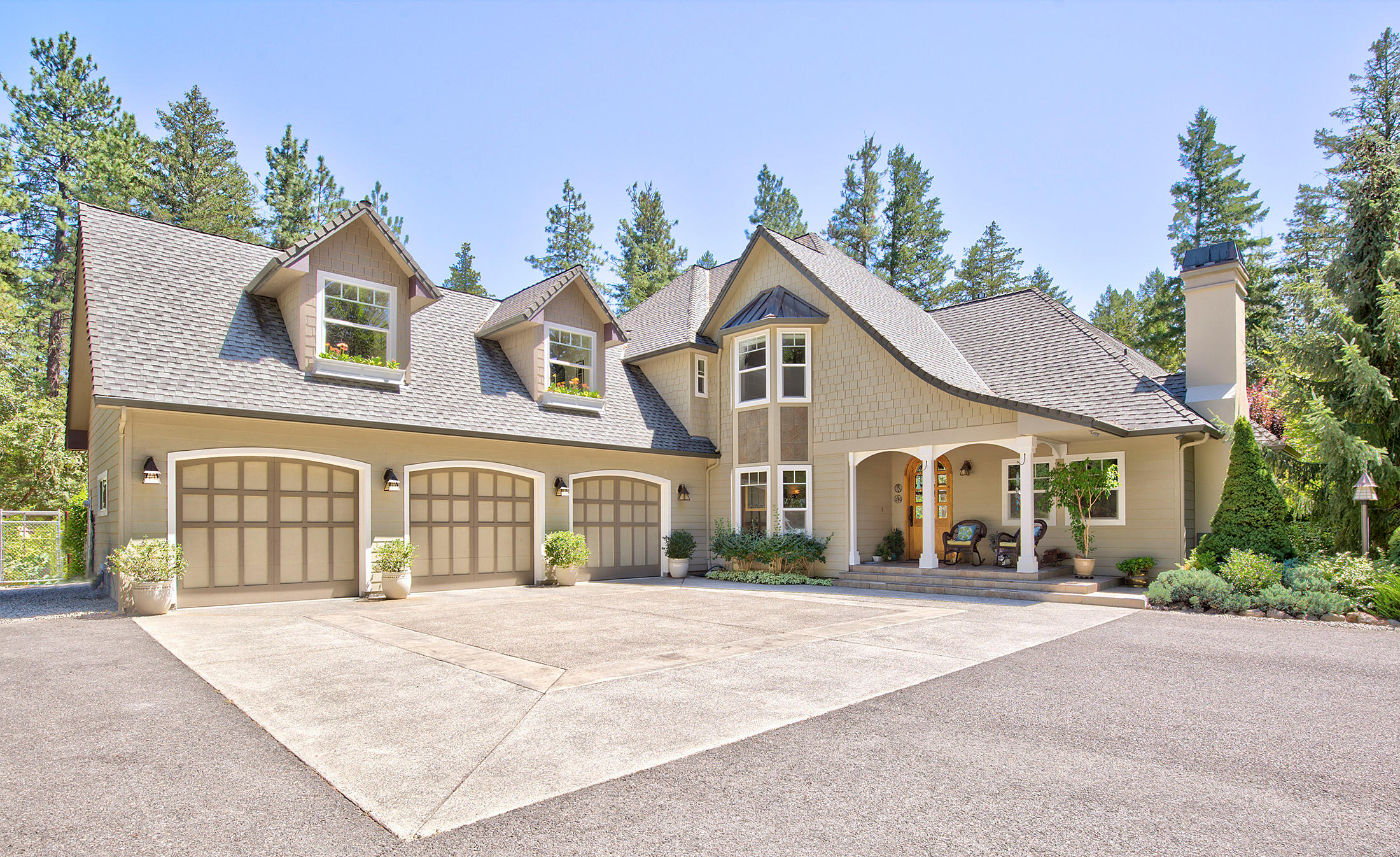 Christened ''Sherwood'' by her designer/builder, & crafted in the Cotswold style of England, this peaceful, private Oregon dream estate is considered to be one of the most well appointed & beautiful homes in Southern Oregon. Meticulous in every detail from the slate tile front porch through the grand arched walnut front door, to the exotic artisan crafted tile & wood inlay entry & rich cherry wood floors. Professional-designed, gourmet kitchen with generous walk-in pantry plus butler's pantry for all your entertaining desires. The interior wood trim & cathedral ceiling was harvested onsite & hand picked by the designer. The spacious main-floor master features a room-sized walk-in closet & spa bath. Enjoy lush garden landscaping from the balcony of one of 2 guest suites. 42x40 RV barn with full bath & full hookups, hobby room, exotic Ipa deck & private access to a massive trail system. A true work of art! Majestic country living just 8 minutes from town. Call for more today!