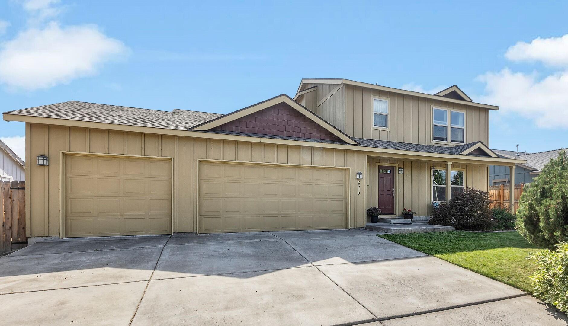 Located in a quiet SW Redmond neighborhood less than two miles to grocery stores, parks, restaurants, Hwy 97 Access & Downtown Redmond. Great room floorplan with a cozy corner gas burning fireplace, large windows for an abundance of natural light, laminate flooring throughout main living areas & covered front patio perfect for your morning coffee or tea. Open kitchen features an abundance of counter/cabinet space, pantry, appliances & spacious dining area with sliding glass doors that lead to the backyard. Well sized primary bedroom with primary bath, double vanity & step-in shower. Two additional well appointed bedrooms share a full bath. Home boasts natural gas forced air, large 3 car garage w/workspace, RV parking, front yard landscaping, fully fenced & southern exposure backyard for great gardening or future landscape!