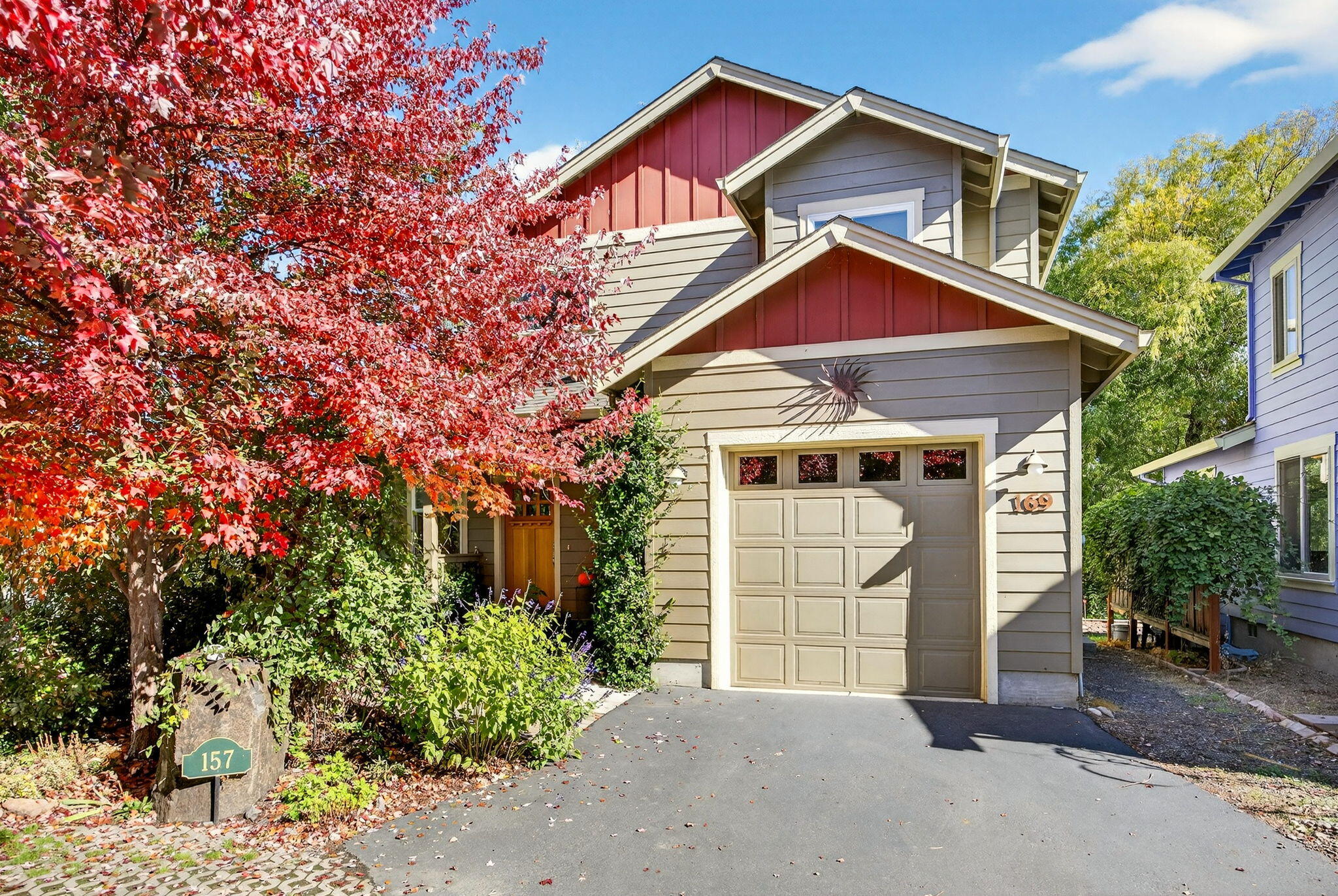 Built in 2015 by Suncrest LLC and certified as Earth Advantage Silver, this well-crafted three-bedroom, two-and-a-half-bath home offers 1,621 sq ft of comfort, quality, and a peaceful setting. The main-level primary suite includes dual sinks with leather-finish granite, a step-in shower, and abundant storage. The kitchen and living area feature matching granite, oak floors, and a cleverly designed pantry under the stairs. Upstairs are two spacious bedrooms, a full bath, and a roomy loft with built-ins.. The zoned HVAC system allows for separate control upstairs, providing year-round comfort. A charming front porch welcomes you home, while the Trex deck at the back overlooks state-designated wetlands, offering rare privacy despite nearby homes. The gas line is ready for outdoor cooking, and both the garage and shed provide generous storage. A quiet cul-de-sac setting close to downtown, cafés, and the post office makes this home especially appealing.