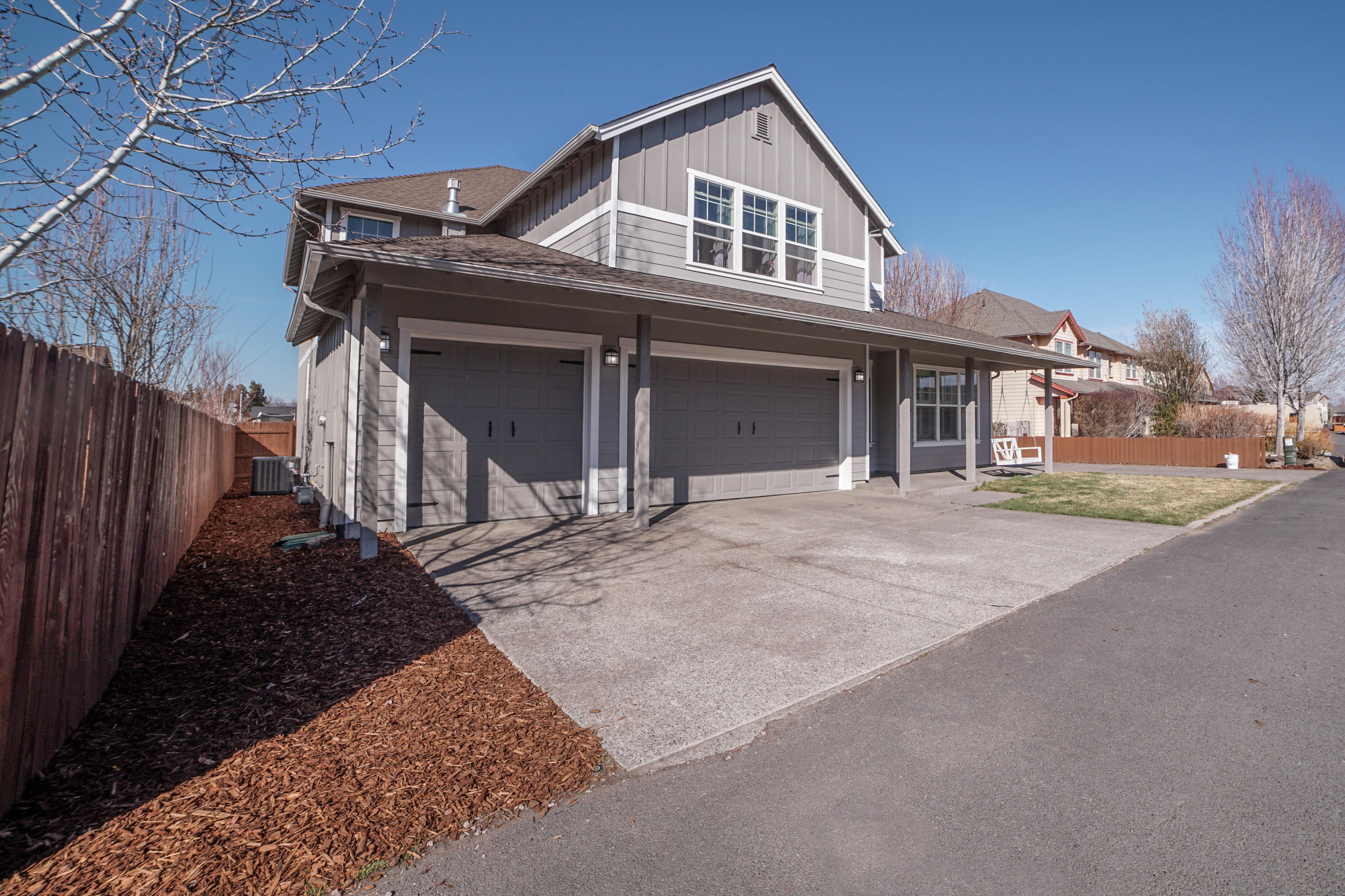 If you're needing room for your large/extended family, then look no further!  This home has been freshly painted, both exterior & interior and is ready to move in!  Recently added French doors to the back deck, along with shutters in the main living area.  Great room plan w/ cozy gas fireplace, expansive kitchen & huge pantry. Casual & formal dining (formal could easily be repurposed). 6th bedroom would be a great bonus room/game room.  Upstairs Master Suite has enormous walk- in closet & newly redone tile shower.  Downstairs master suite with access to private deck/yard.  AC, Heater, and oversized H20 Heater are all less than 1 1/2 years old. Covered front porch & patio perfect for relaxing, & large trek deck in the back for entertaining, along with hot tub, big yard & 8X20 shed.  Double RV parking on a 16X66 concrete slab with room for all of your toys. Finished 3 car garage.