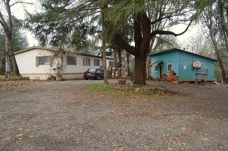 The home is in need of major repairs. Selling at land value for the homesite, well, septic and power. Remove the existing manufactured home and build the home you haven't been able to find.