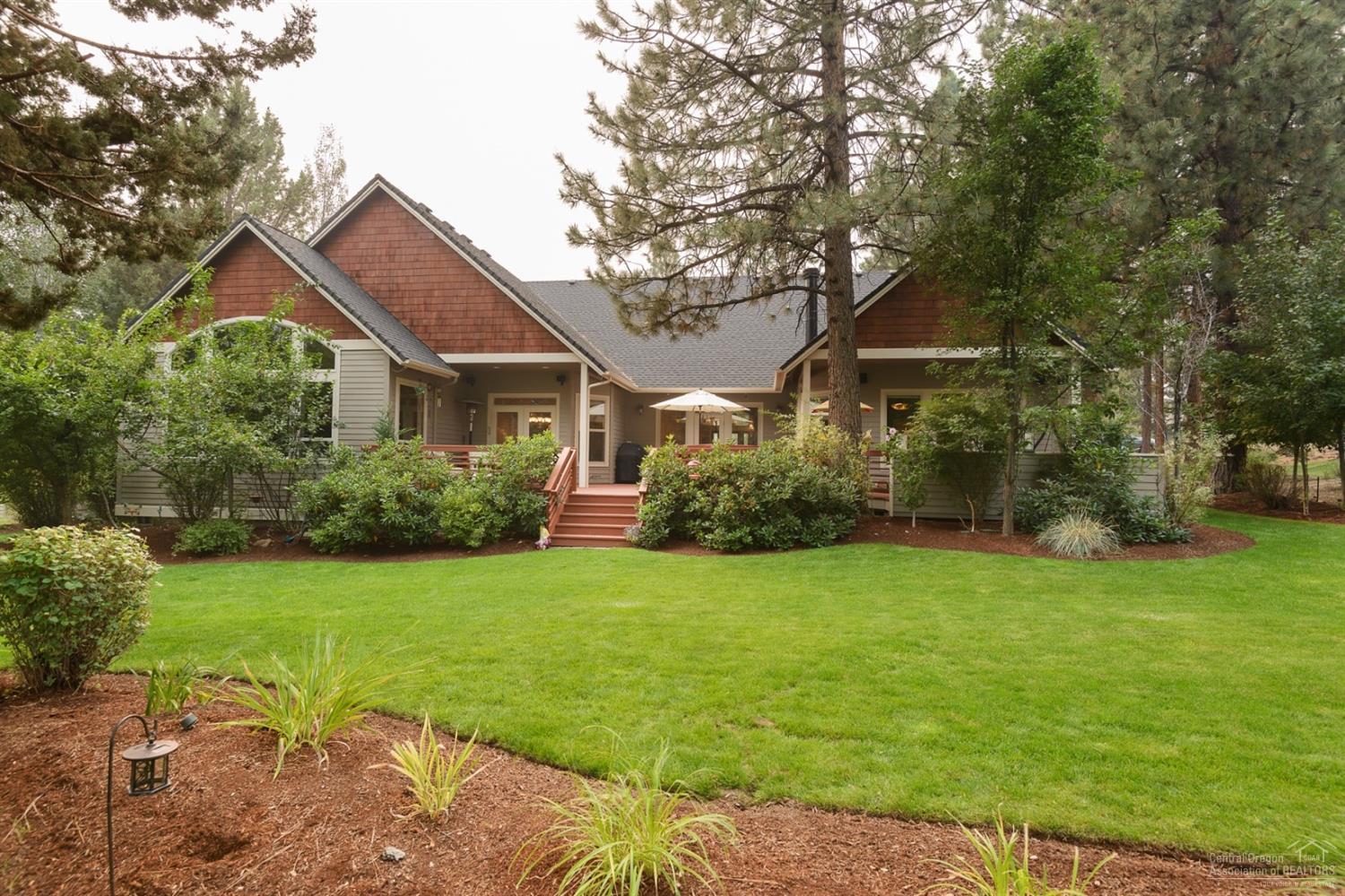 This one-of-a-kind Awbrey Glen home is perfectly situated on a flat lot with golf course views, enjoys outdoor living on the expansive shady deck and has an ideal layout. With only a bonus room & full bath upstairs, this home boasts a spectacular master suite with spa-like bath, 3 addl. bedrooms, office, gourmet kitchen and great room all on the main level. Abundant windows invite natural light throughout. The oversized 3-car garage is perfect for the Bend lifestyle. Golf or social membership not required.
