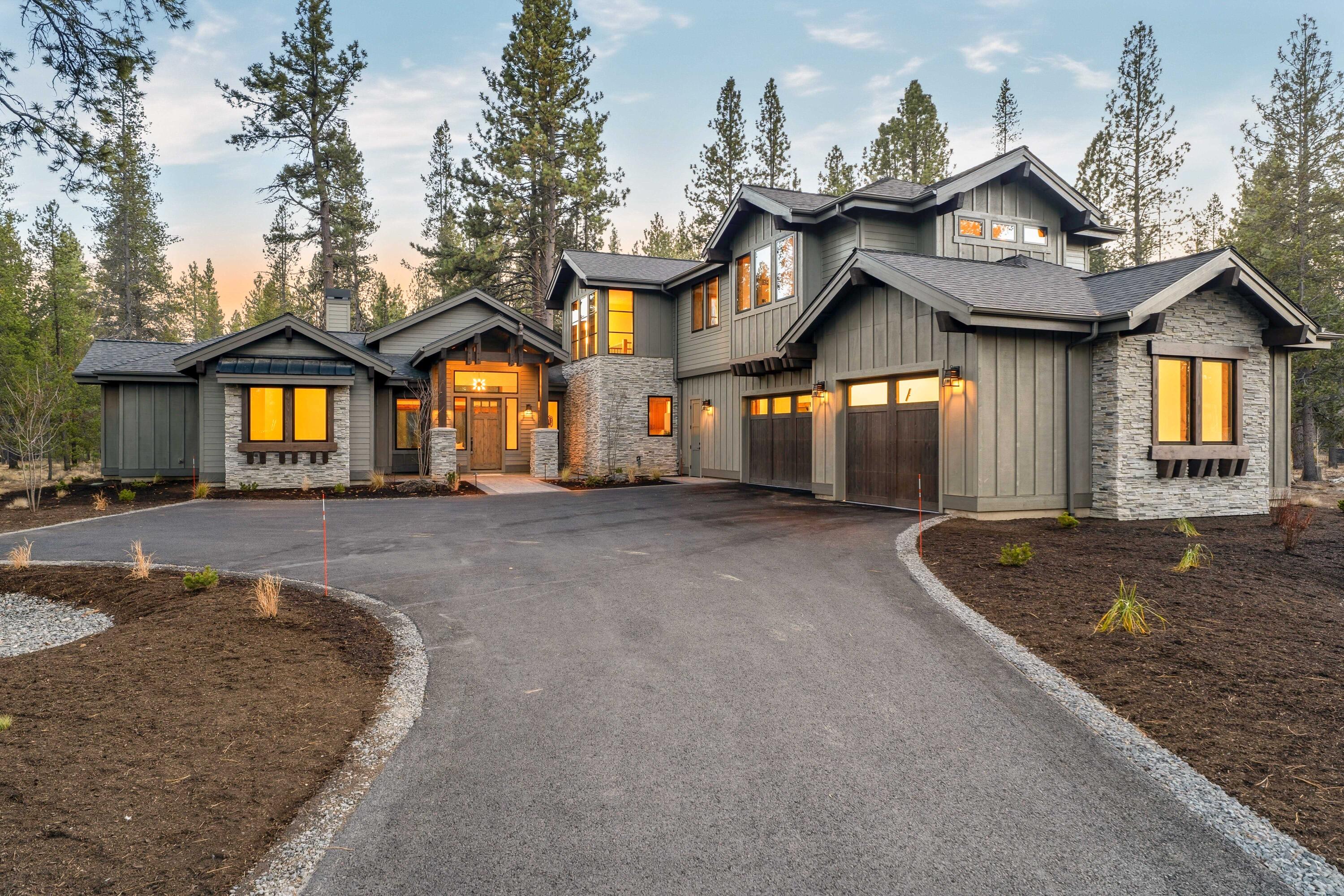Introducing a new construction 6-en-suite bedroom, 7-bath home backing to the Wildlife Forest Preserve in Caldera Springs. This home has room for everyone & more, featuring 4 main level en-suites, a vaulted den, & an upper level complete with an en-suite bedroom, en-suite bunkroom with custom built-in bunks, & a spacious bonus room.  The great room features exposed beam detailing, 60'' linear gas fireplace with floor-to-ceiling stone surround, custom built-ins, & a 4-panel multi-slide stacking door leading to the covered patio. The luxurious primary suite opens to the outdoors with French doors and features a spa-like bath with freestanding tub, tile shower, walk-in closet & an additional exterior access door. Set on a generous 0.48-acre homesite, enjoy forested views from the southern-exposed back patios. Enjoy a vaulted covered area, dedicated hot tub enclosure, built-in BBQ & fire pit. 3-car garage. A thoughtfully designed, highly-appointed home to make your new Central OR basecamp