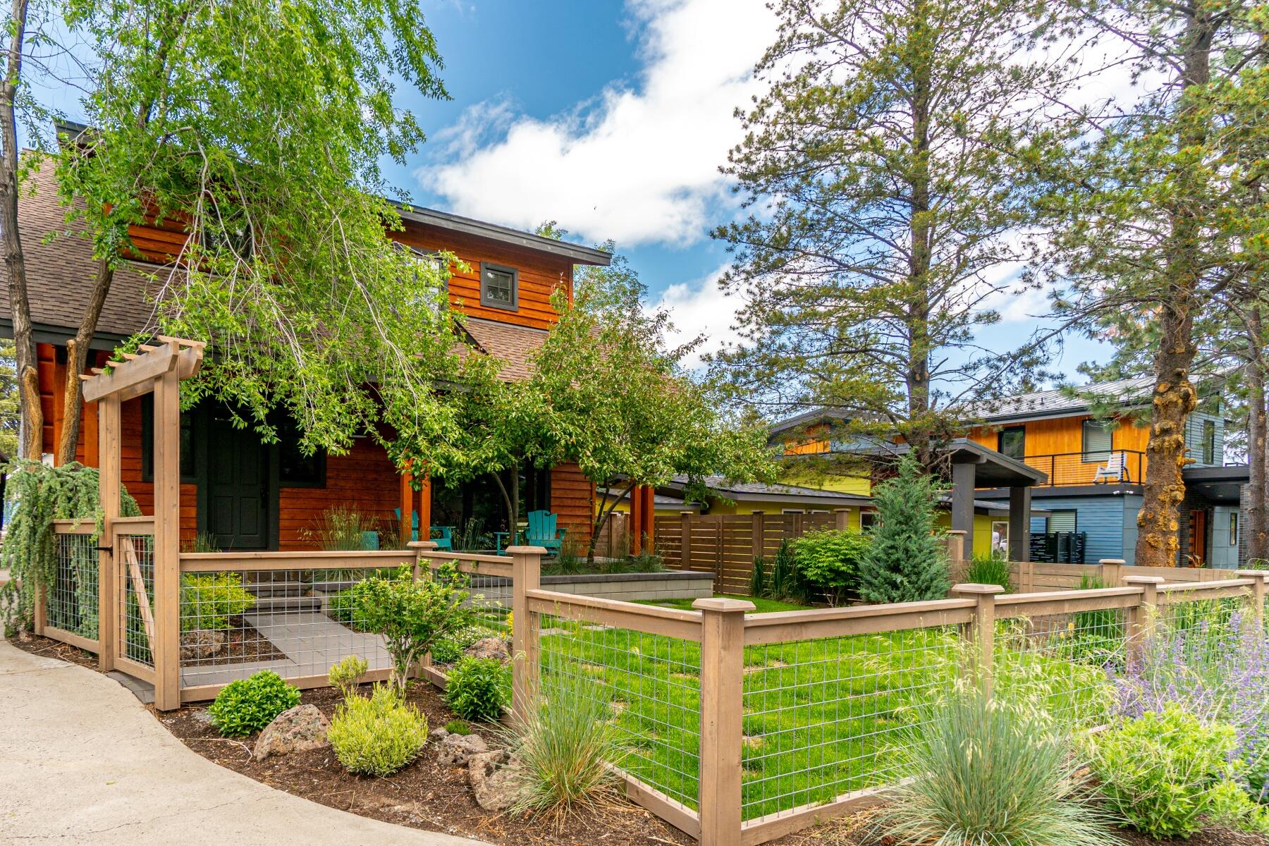 This is a rare find in downtown Bend! This home offers charm and functionality with recent updates including kitchen, flooring, bathrooms & utility room, indoor/outdoor living spaces, landscaping & fencing remodeling. The open concept main level w/ a separate office offers additional flexibility in the floor plan. 3 bedrooms, 2 bathrooms are on the upper level. On the exterior enjoy the quaint yard, a pull through driveway, 2 car garage w/ guest space or home office above as well as & alley access. This home is moments to downtown, Galveston and the Newport corridors for dining, shopping, breweries and concerts & farmers market.