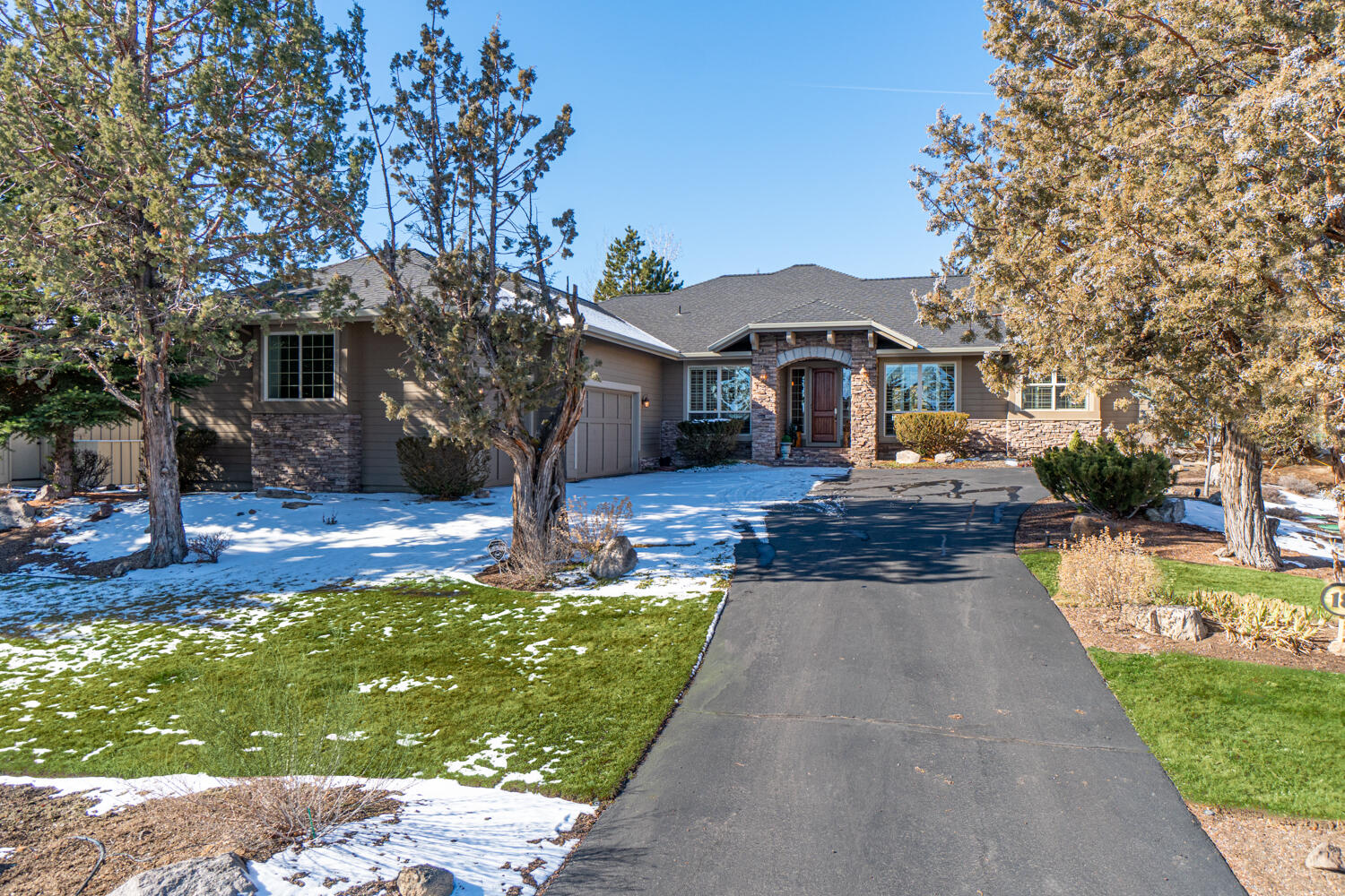 Gorgeous custom home on the 11th fairway of the Ridge Course at Eagle Crest Resort! This single-level beauty boasts 2953 SF with 4 bedrooms, 2.5 bath  with a den/office. Open floor plan featuring walls of windows, high ceilings, new luxury vinyl floors, gas fireplace and stereo surround. Gourmet kitchen with prep island, gas cooktop, stainless appliances, walk-in pantry and lots of cabinets for storage. Master suite has patio access and walk-in/walk-through closet with double sink vanity, tiled shower, soaking tub and private water closet. Two of the guest bedrooms have walk-in closets with jack and jill bathroom. The large utility room and oversized 3-car garage complete this outstanding floor plan. Expansive back paver patio is perfect setting to relax and entertain. Enjoy all the Eagle Crest amenities including three 18-hole golf courses, sports centers, miles of walking/bike trails, restaurants and Deschutes River access!