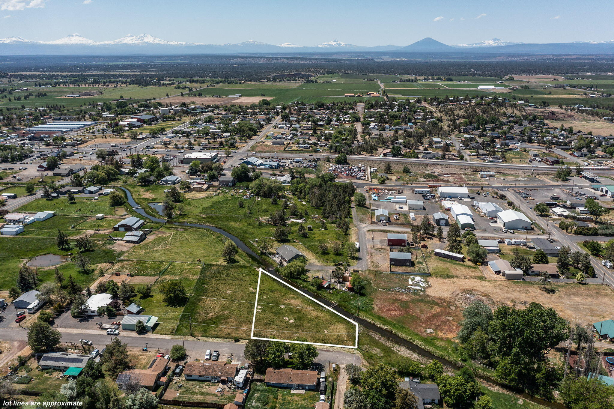 Fantastic opportunity to build a home or place a manufactured home on this versatile half-acre lot in the heart of Terrebonne. Septic approved and eligible for connection to city water, this property offers both convenience and flexibility. Enjoy Cascade Mountain views and a central location just minutes from schools, local shops, restaurants, Smith Rock, and quick access to Hwy 97. Whether you're looking to invest, build, or create a peaceful retreat, this property is full of potential.