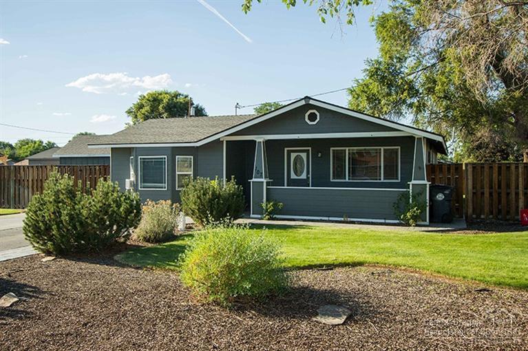 Single level home on 0.24 acre corner lot in north central Redmond. Fully fenced and landscaped. Home sits well back, affording deep front yard. Covered front porch. Convenient galley kitchen with sliding door to deck from dining area. RV parking area, graveled play area, storage shed. Close to Redmond's revitalized downtown and Civic Center area and only a few blocks from St. Charles hospital and surrounding health care services.