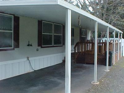 Nice, clean one owner. 2004 manuf home of 1056 sq ft. 3 bd, 2 ba, open floor plan located in a senior park at the end of the loop. Covered deck off the front and covered porch off the back. Carport. Fenced back yard for your pet. Some gardening tools and yard gingerbread included. Watch cows and horses in the pasture outback. Priced below assessed value. Hurry on this one. Seller says Make it go. Submit all offers!