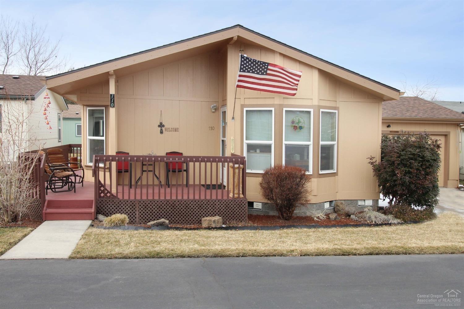 Beautiful 55+ Snowberry Village. Near medical community & lots of shopping. Walk to grocery store, restaurants & shopping. Regular resident-run clubhouse activities. Well maintained home with so many updates; Huge, island kitchen with large breakfast area -Refrigerator Included!; Lots of cabinet space; Formal dining room or use as a den or office. Washer & Dryer Included! Deep sink in utility. Roof new in 2015; Exterior painted in 2018; New gas water heater in 2018; Gas furnace. New front door in 2018. Home Warranty Included. Enjoy a nice covered front porch area or relax on the back patio. Double Garage. RV Parking in Snowberry Village for nominal fee. Space Rent is $500/month - Includes Water, Sewer, Lawn Mowing, Clubhouse, Street Snow Removal. Come see!