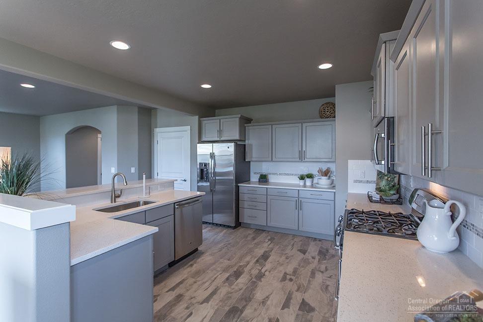 The 2250 square foot stylish and versatile two-story Talent is a plan designed to fulfill all of your must-haves. The first floor features a wonderfully open kitchen with dining area and great space, which is the perfect place for entertainment or relaxation. Upstairs is home to the spacious bedrooms, laundry room, and an extra full bathroom. The master suite has an oversized closet and ensuite bathroom complete with double vanity. The rest of the upper lever contains a multipurpose loft area, which can be converted to a den or fourth bedroom. Another option for this space is to add a desk for a convenient office area. With all of this, plus plenty of storage solutions, the Talent offers style, function and space and will be ready in Summer.