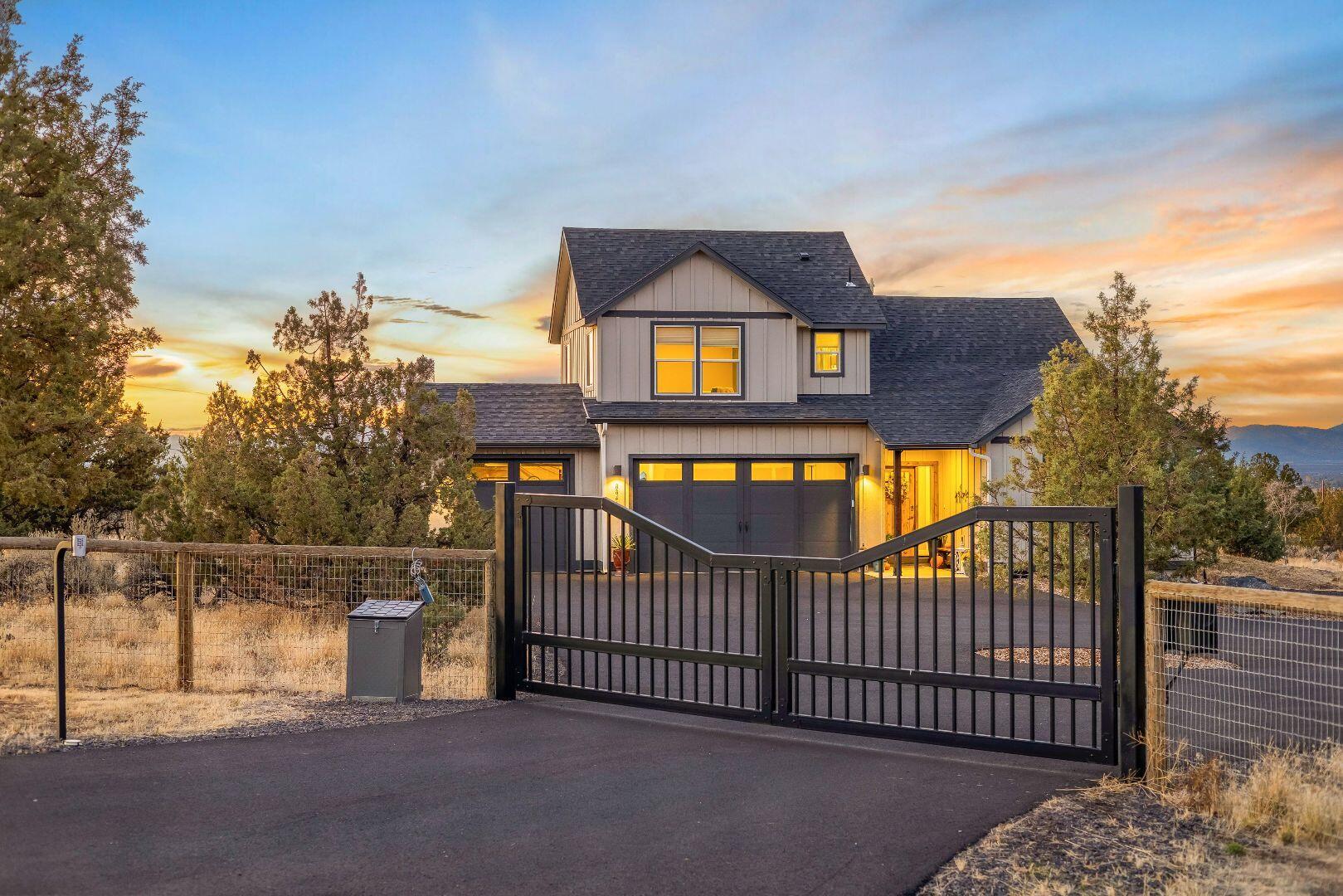 Luxury living in Powell Butte! This beautiful 2,583 sq. ft. home sits on nearly 5 private, gated, and fenced acres just minutes from Bend. Featuring 4 bedrooms plus an office, this property offers flexible living with a guest suite or bonus room above the oversized triple-car garage. Enjoy stunning Cascade Mountain views from every direction. Two additional outbuildings provide plenty of space for RVs, ATVs, or all your Central Oregon toys. This property perfectly combines comfort, function, and the peaceful beauty of country living—an exceptional retreat in one of Central Oregon's most desirable areas.