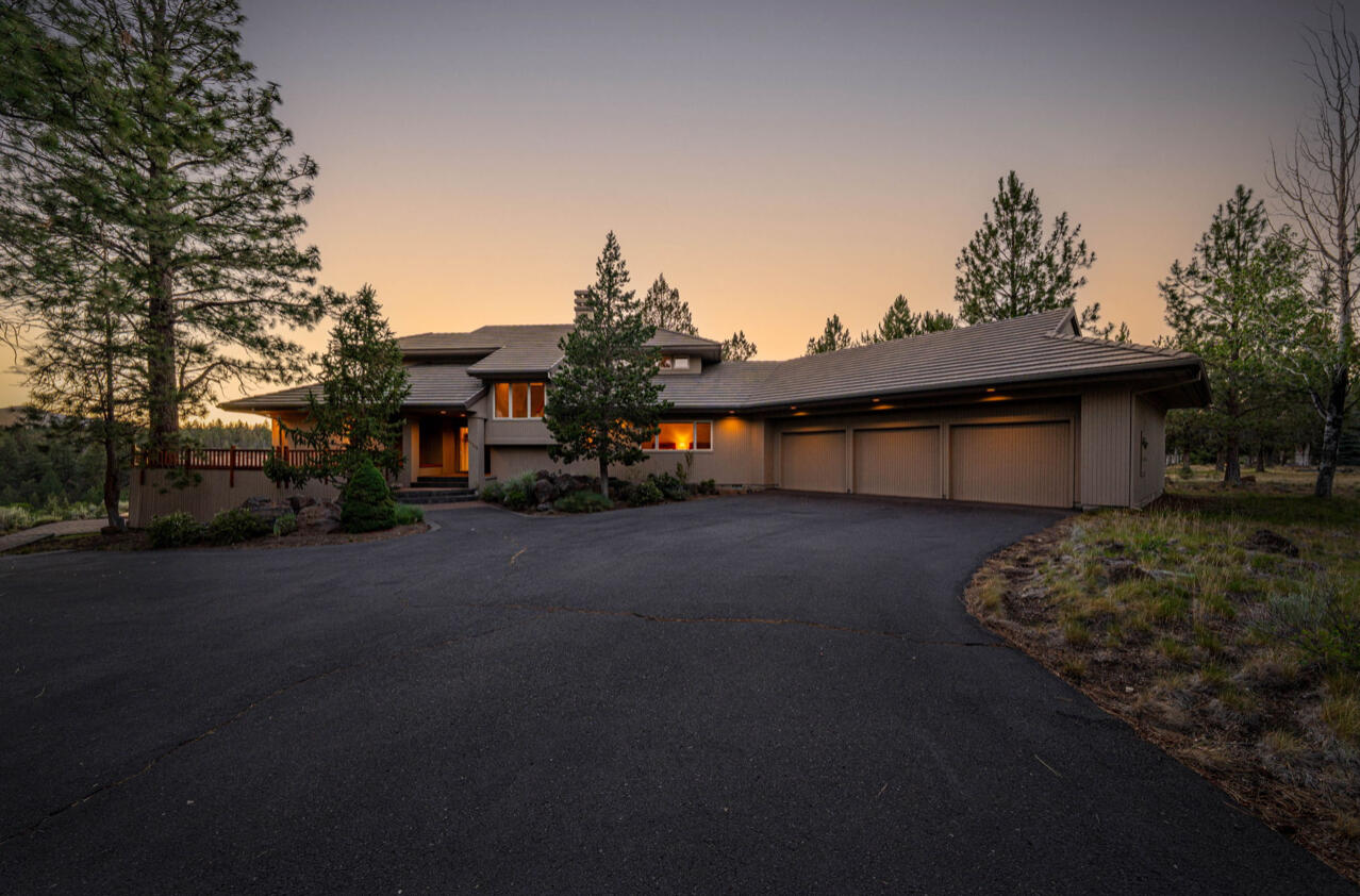 Perched above Whychus Creek in the prestigious Rim at Aspen Lakes, this custom-built retreat offers an extraordinary blend of privacy, serenity, and sweeping
Cascade views. Gently lived in as a second home, the home reflects quality construction, extensive built-ins, and intentional design in every detail. Inside, a
sunken living room creates a warm and inviting focal point on the main level, where two junior suites provide comfort and privacy. Upstairs, the vaulted primary
suite is a sanctuary of its own, with walls of windows that frame breathtaking views in every direction. Step onto the expansive wraparound deck and take in the
sounds of the creek below, with Deschutes National Forest unfolding just beyond—nature truly surrounds you. A spacious 3-car garage offers ample storage for
your Central Oregon lifestyle, and the low-maintenance 2-acre lot allows you to spend more time enjoying it all. A rare opportunity to experience refined
mountain living at its best.