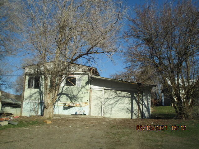 Work in Progress.  Older manufactured home on a large fenced lot (0.26 acres).  Has a garage and mature fruit trees (apple, plum and apricot).  Conveniently located near public transportation and easy access to major roads.
