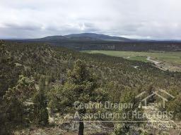 Amazing Cascade and Crooked River Valley Views, private, and only 10 minutes from town. Come build your dream home on this 60 acre parcel. Power is close by, septic is approved, and community water is available. What are you waiting for!