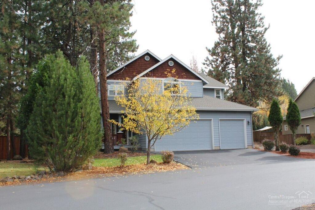 Looking for a 4 bedroom home close to Mt. Bachelor? This is it! Beautiful hardwood floors throughout the kitchen, dining room, entry, and hallway. Kitchen features a pantry, granite counters and good storage. Soaring vaulted ceilings. The living room is lined with windows to bring in ample natural light. Master features a cozy gas fireplace, shower and soaking tub. Walking path and numerous trees makes this lot feel larger than it is. 3 car garage.