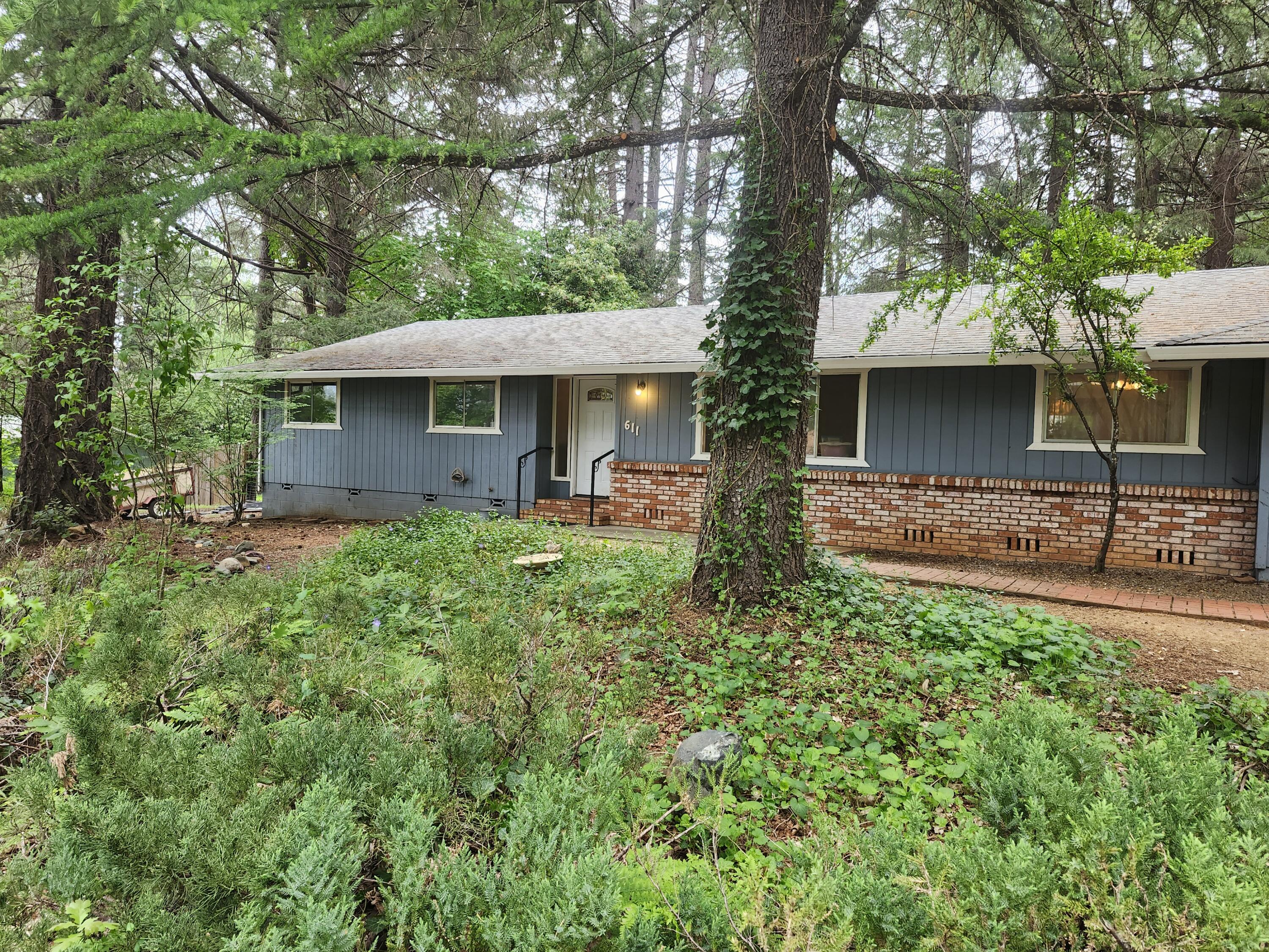 Ranch Style Home located in a Quiet neighborhood. 3 Bedrooms 2 Full Baths and attached double car garage. Home is 1549 sqft on almost a half-acre ( .47 ) . Formal living room, family room kitchen combo. Separate formal dining room. Home has good bones and is financeable with some recent repairs and lots of potential for the buyer to put final touches on. Very large concrete patio area off family room, where the beautiful conifers shade the yard area. Lots of accessory buildings and plenty of room RV parking and toys. Located in good neighborhood near all town conveniences. Come see this diamond in the rough today!