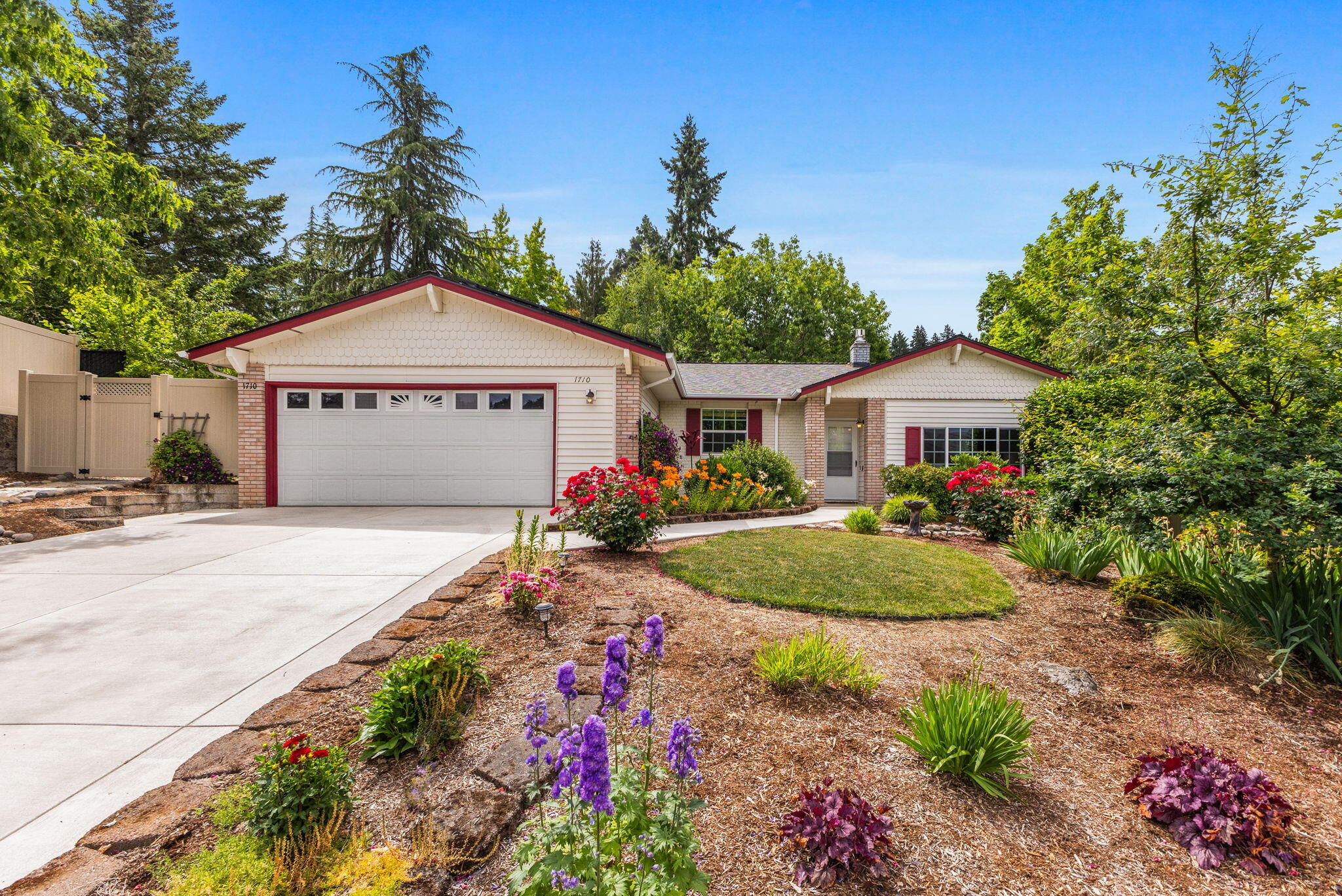 Looking for a home where style, quality, functionality, AND location combine? Look no further than this 3 bed, 2 bath beauty, nestled in the desirable Laurel Springs neighborhood. Inside, you'll enjoy the numerous updates, separate living spaces, brick fireplace, and efficient layout. Outside, you'll appreciate the tranquil setting created by lush greenery and comfortable outdoor seating, including a newer hot tub. Other highlights: new roof in '18, paid-for solar, new AC and water heater in '24, and newer appliances included!