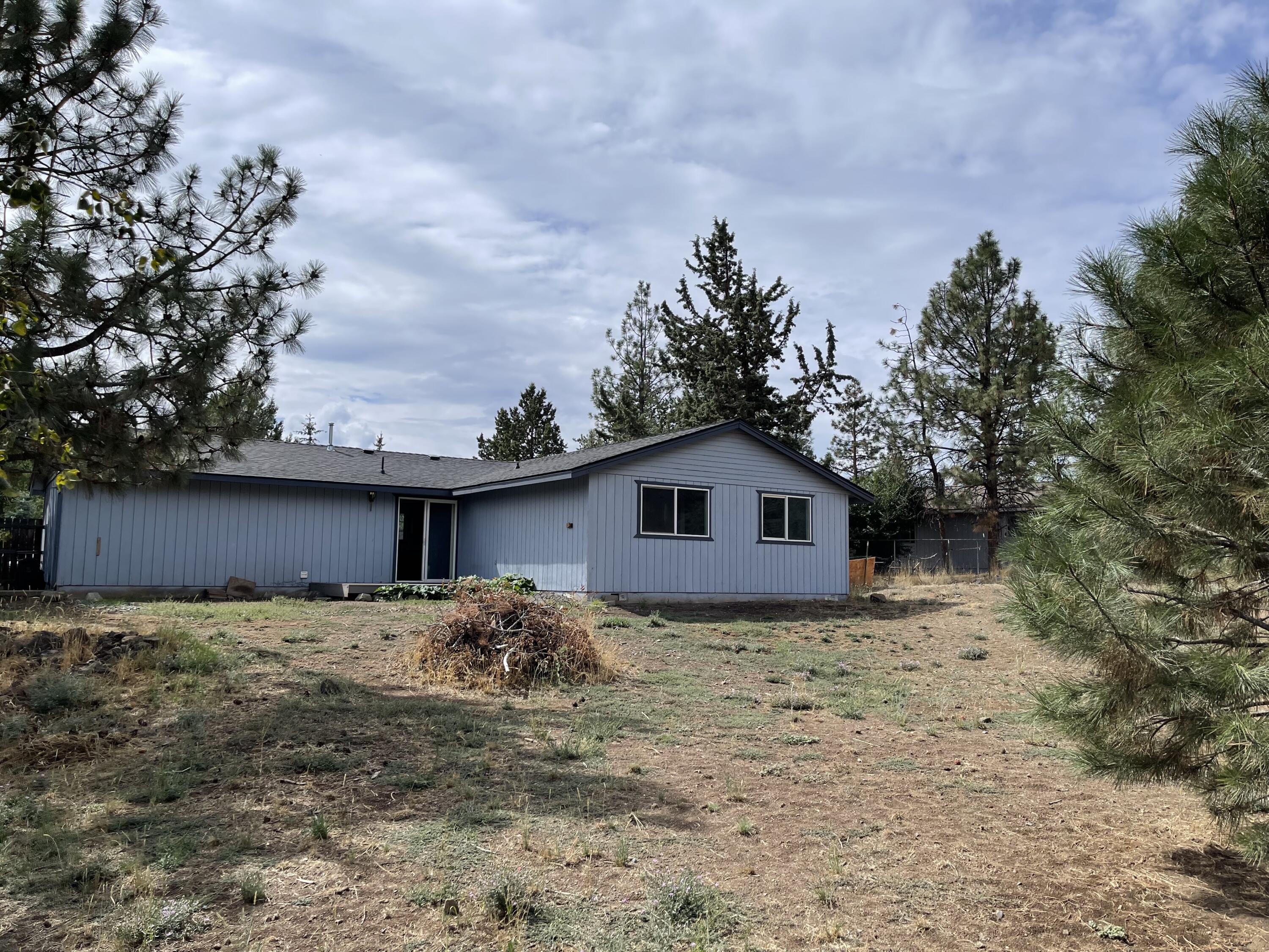 Solid single-level home on 1/2 acre with endless potential. Don't miss this incredible opportunity! This well-maintained single level home sits on a spacious half-acre lot, offering room to grow with plenty of space for a shop or future expansion. Features include a newer roof and a central location close to everything. Whether you're a first-time buyer, investor, or looking for room to build, this property delivers value and versatility.