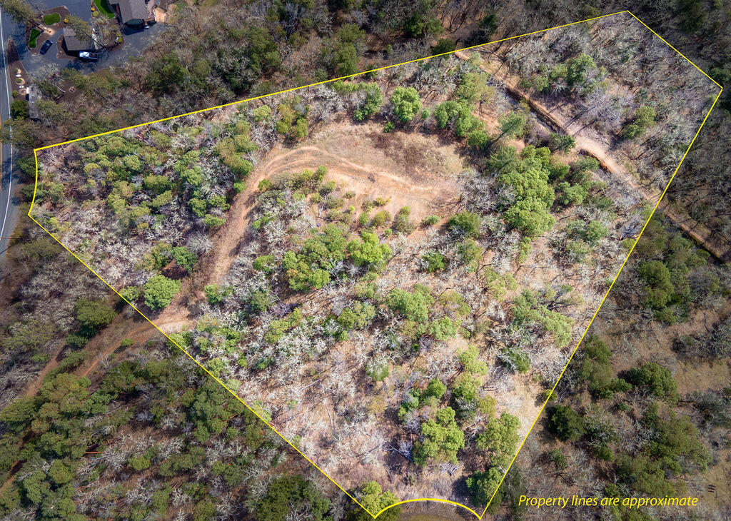 Welcome to your slice of Southern Oregon serenity! This private and peaceful 6-acre parcel offers sweeping mountain and valley views and the perfect setting for your custom home. Enjoy the convenience of a shared well, previous sand-filter septic approval, and roughed-in driveway to simplify your build. CC&Rs help maintain the area's quality and charm. Located within walking distance to Pearce Park and the Rogue River, and just minutes from shopping, dining, and medical services, this property provides the ideal blend of country tranquility and in-town convenience. Don't miss this opportunity to create your dream home in a truly beautiful setting!