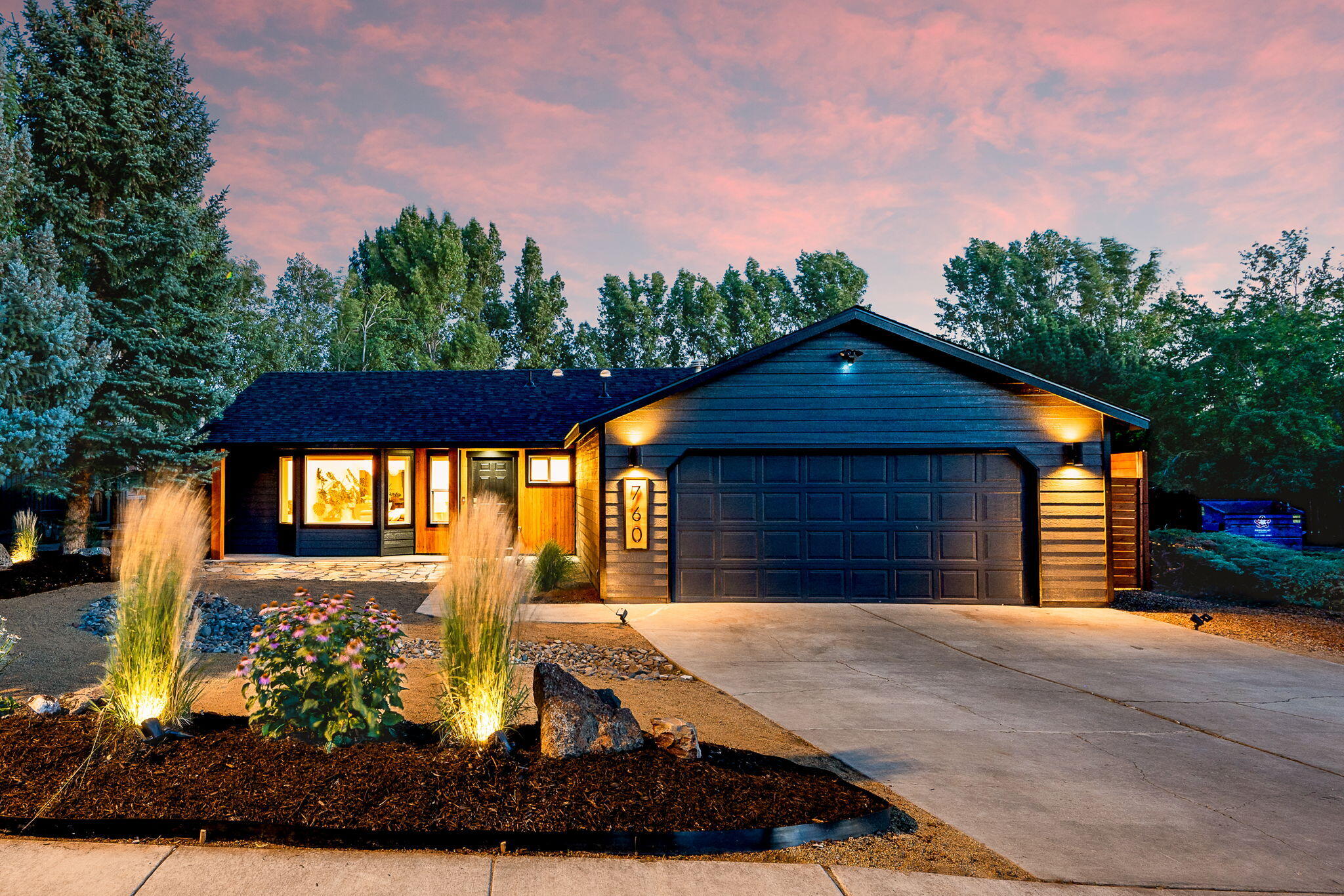 This stunning mountain-modern home blends striking curb appeal with the warmth of Scandinavian-inspired interiors. Completely remodeled less than two years ago, it boasts a new roof, new AC, waterproof laminate flooring throughout, and a tiled primary shower. The kitchen is a showstopper with quartz countertops, a waterfall island, and included stainless steel appliances. Gather around the real Venetian plaster fireplace or enjoy the outdoors in the low-maintenance xeriscaped yard with garden beds, all enclosed by an 8-ft tall privacy fence. Thoughtful upgrades include Ring security floodlights and doorbell, plus a workbench and tool chests in the garage. Washer and dryer are also included—making this home move-in ready in every sense. Modern luxury, turnkey convenience, and timeless style await. Reach out to your favorite realtor for a complete list of upgrades and to schedule your tour today!