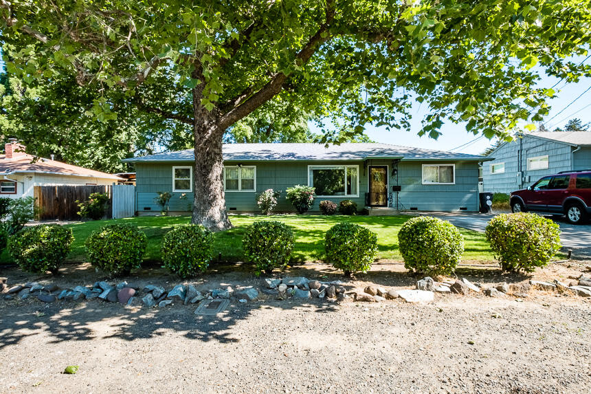 Located in desirable Old East Medford, this Art Dubs built house is ready for new owners. Boasting 4 beds and 2 baths, this 1425 SQFT home and landscaping have been meticulously maintained throughout the years. Some landscape features to note are the Sycamore tree in the front yard, legacy rosebushes, hydrangeas and a Modesto Ash tree in the back yard.  Inside note the split floor plan with the master suite opposite the other bedrooms, hardwood floors, galley kitchen, gorgeous ceiling texture, and plentiful natural light.  The detached workshop/carport in backyard has ample space for storage and long driveway gives room to park a boat or RV. Recent updates include new roof and flooring in the laundry / bath. Schedule a tour today!