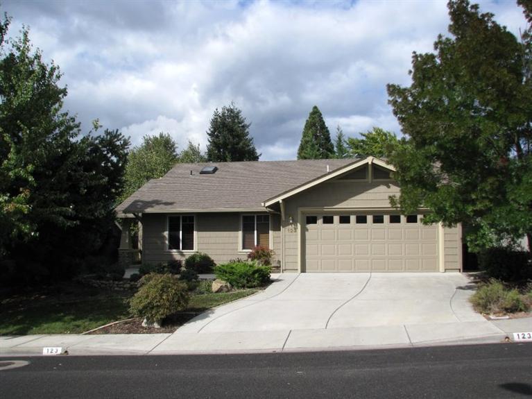 Come Home For The Holidays!!!!!! It's a great place to start your holiday season in this warm, comfy and charming 3 Bedroom, 2 Bath , 1592 SF home on .14 Acre. This home is located in the desirable neighborhood of the Phoenix Hills Subdivision. Split floor plan, Hardwood floor entry, beautiful great room, gas fireplace, vaulted ceilings, light and airy, well laid out kitchen that opens to the great room, refrigerator, microwave, breakfast nook, French door to patio from kitchen, master suite with large walk-in closet and French door to patio, master bath has double sinks, gorgeous well maintained private backyard with covered patio, new exterior paint in 2015, and 2 car garage. Call now for your personal tour of this exceptional home.
