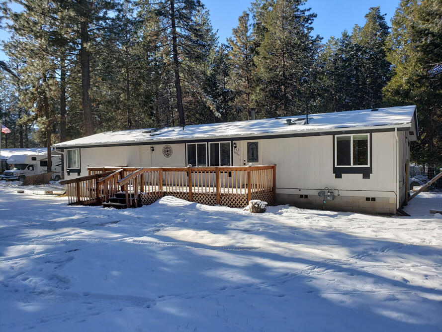 Don't miss this opportunity. This is a great location with an acre of fenced property. There is plenty of room for activities and 3 decks that will allow you to create a great outdoor living space/patio. The front deck has a ramp for easier access if needed. The back yard has lots of room for gardening. There are 3 full bedrooms and additional office space that could make a fourth bedroom. Open floor plan and new appliances.