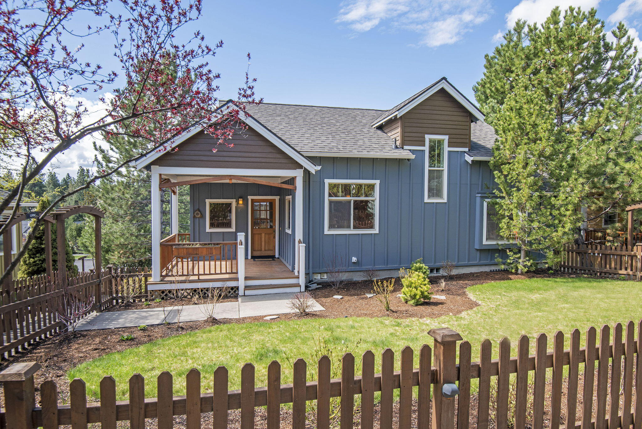 Very cute cottage condo in NW Bend at the desirable Cottages at Westside Terrace. This stand-alone unit has been well cared for and is very charming and comfortable while being in an ideal west Bend location. The main floor features the primary bedroom, kitchen, dining area and great room.  The upstairs loft area can function as an additional bedroom, office or flex area and also has a large, finished attic area for plenty of storage room. HOA fees cover exterior maintenance, landscaping, trash/recycling, water, sewer and snow removal.