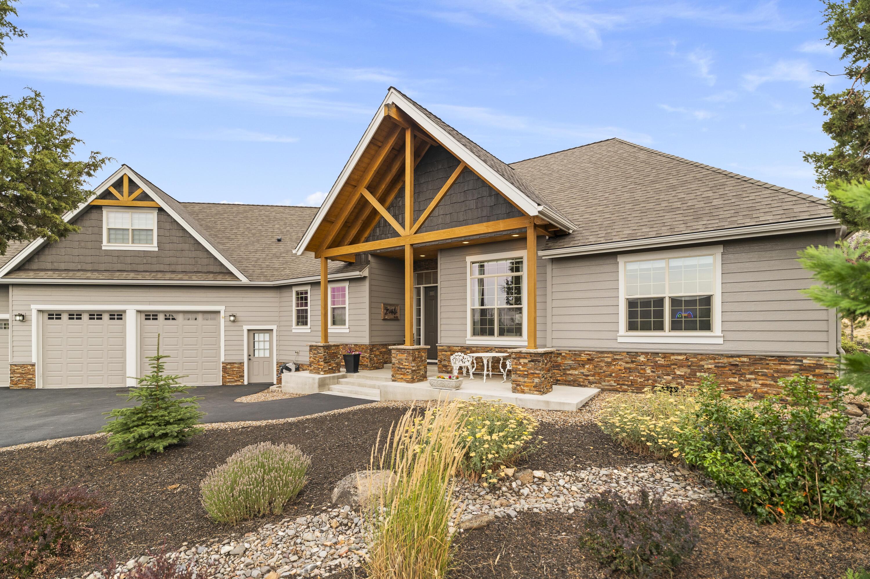 Gorgeous custom home on the West Ridge in Eagle Crest Resort! Open floor plan features 3 bedrooms, den, powder room, and utility on main floor. Master suite with walk-in closet has custom built-in closet system. Master bath has heated floors, an extra large walk-in shower with dual shower heads, plus a soaking tub. Second floor is a huge bonus room with beautiful views. The yard is beautifully landscaped and mature, and has a full drip system. There is an expansive covered patio with drip for your hanging baskets and patio flowers, a hot tub, and raised bed garden boxes with their own programmable drip system. The garage has three bays with extra storage. The house exterior was painted in October 2023. COREtec luxury vinyl, wide-plank oak flooring was just installed! This home is loaded with upgrades and luxury finishes throughout. Eagle Crest owners enjoy three golf courses, three sports centers, a day spa, and miles of walking and biking trails.