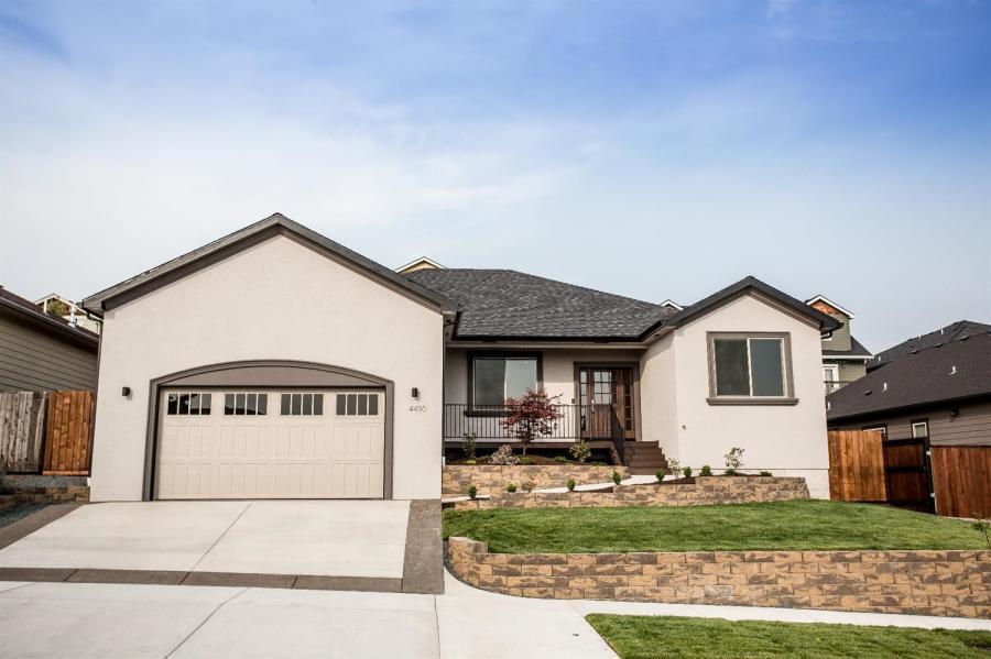 Absolutely Amazing Custom Home located in Beautiful Vista Pointe Estates. Super Energy Efficient w/Energy Star Rating. This single-level, open split-bedroom floor plan boasts so many high-end features we couldn't begin to list them all! Just a small list: Custom Stucco exterior, engineered hardwood flooring in kitchen, dining, living room & entry, LED lighting, rock accents, tankless on-demand hot water, covered back patio w/natural gas hookup for BBQ, custom cabinets, oversized kitchen has granite counter tops, walk-in pantry, Bosch Stainless Steel Appliances, convection wall oven & micro, 5-burner Gas cook top, farmhouse sink & huge prep island; the list goes on. The spacious living room features gorgeous built-ins & a cozy gas fireplace. Amazing master suite with huge walk-in closet, oversized shower, dual vanity w/granite counter tops & tile shower. Attached 2-car finished garage & completely landscaped front & back yards w/timed sprinklers.