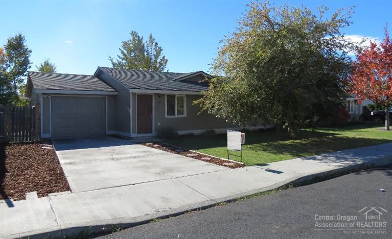 SW Redmond home, vacant and ready to go. Extra parking. Large backyard with deck and mature trees. New refrigerator and microwave and new roof.