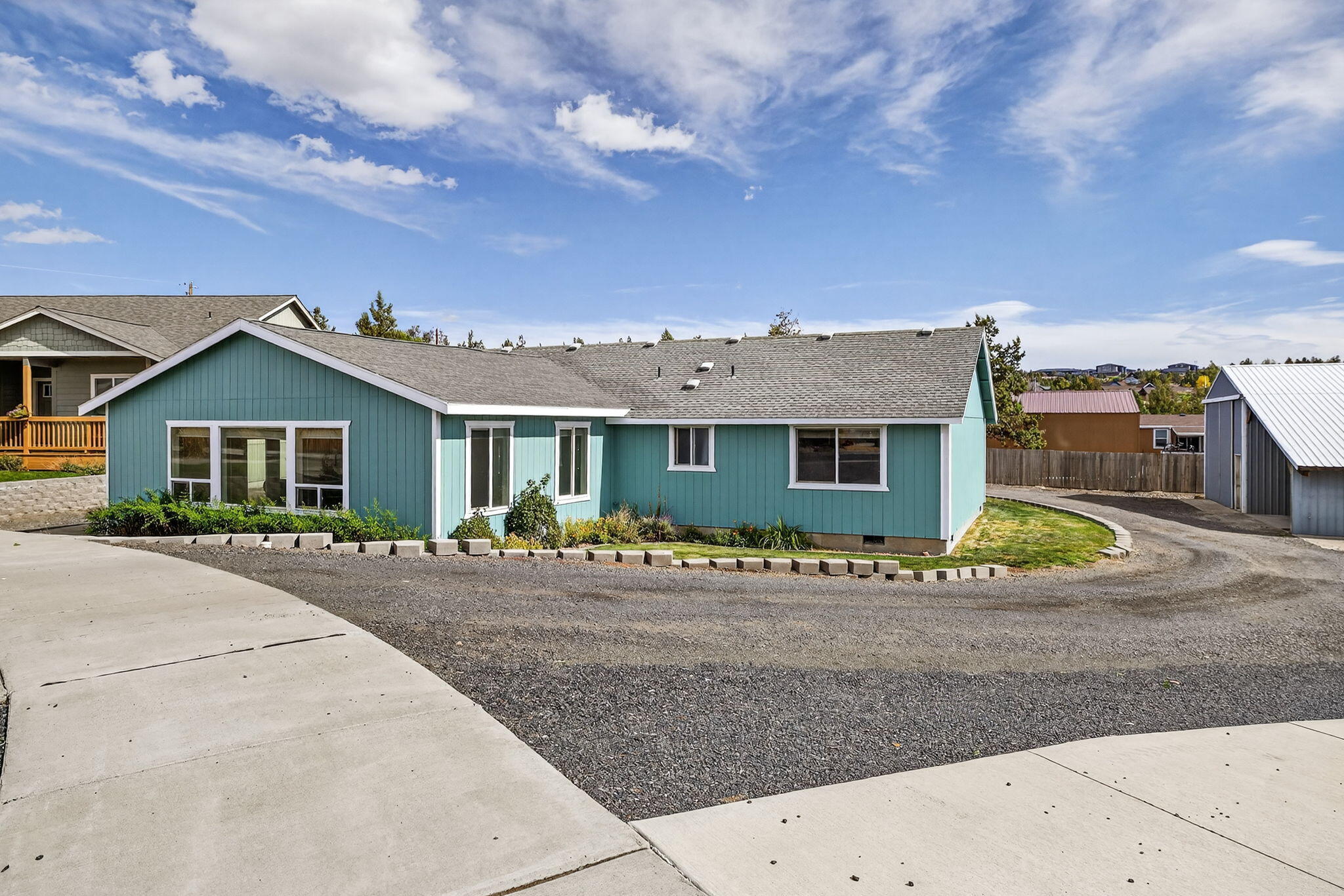 Spacious single-level home offering 2,344 sq ft of comfortable living on a generous .37-acre lot in a quiet cul-de-sac. This 3 bedroom, 2 bathroom home features vaulted ceilings, an office, and a bonus room for flexible living options. The inviting family room boasts a natural gas fireplace and new laminate flooring, which also extends into the office and bonus room. Fresh exterior paint adds curb appeal. Outside, enjoy a 25x30 shop wired with 220 volt—perfect for projects, storage, or hobbies—plus plenty of room to park your RV, boat, or toys. Ideally located close to schools, parks, shopping, and the Madras Aquatic Center.