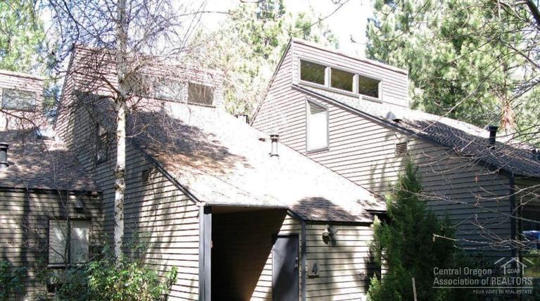 Great second home or vacation rental w/proven history. Furnished. On the Meadows Golf Course with great views. Second bedroom is actually a spacious loft. Convenient to Sharc,village & bike trails. Furnace replaced in 2008. Skylights let the outside in as the gas fireplace keeps you warm and cozy. Kitchen stove new and blinds throughout are as well.