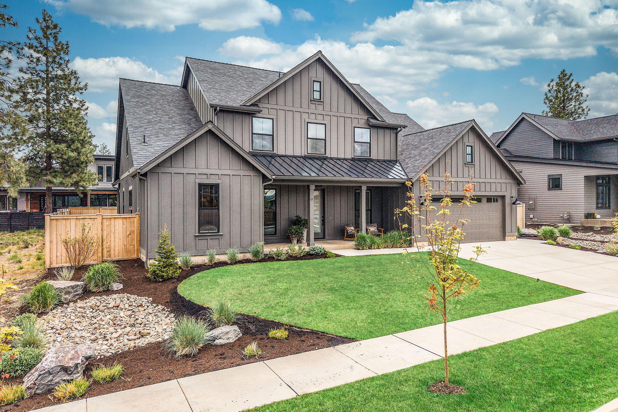 Presenting a stunning home in coveted Shevlin West. Step inside to hardwood floors and elegantly designed open living spaces filled with natural light from expansive windows. The gourmet kitchen shines with a 10-ft island, custom lighting, and top-tier stainless steel appliances. The main level features a luxurious primary suite with a spacious bath, walk-in closet, and second laundry. A versatile office, den, or extra bedroom is also on this level. Upstairs includes two bedrooms with a Jack-and-Jill bath and a versatile guest suite with en-suite bath, which can also be used as a bonus room. Large windows throughout the home showcase beautiful Cascade Mountain views and create a light and bright atmosphere. The landscaped, fenced yard offers a peaceful retreat with mature foliage. Enjoy luxury living near trails, parks, and top-rated Bend schools. Make this exceptional home yours today!
