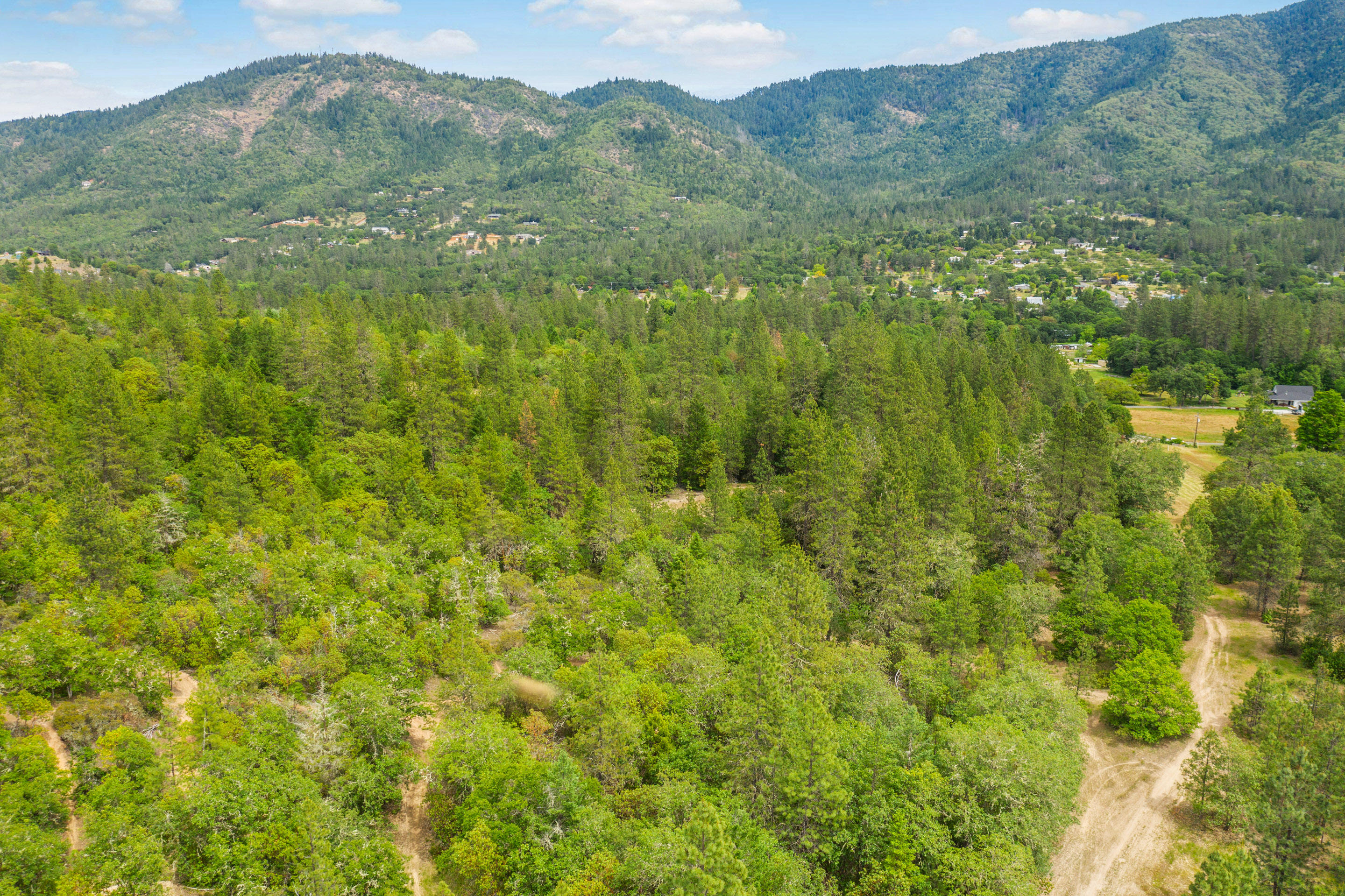 Welcome to the Walker Road property. Spanning 81.55-acres, this prime development land is approved for an exclusive rural residential subdivision minutes to the conveniences of Grants Pass and greater Southern Oregon. Directly bordering city limits, the location is close to everything Southern Oregon has to offer. Set on the sloping hillside of Cathedral Hills, the property gently raises to meet the public lands and trail systems at the summit, overlooking a private valley. The property is close to the Grants Pass Country Club, Asante hospital, I-5 access, schools, entertainment, and more. Southern Oregon as a whole is known as a developing wine region and niche agricultural community with a strong small-town culture. With a highly sought-after Mediterranean climate, the area is an outdoor recreational paradise with access to thousands of acres of public lands, phenomenal hiking, camping, and horseback riding, as well as attractions such as Crater Lake National Park and the Rogue River