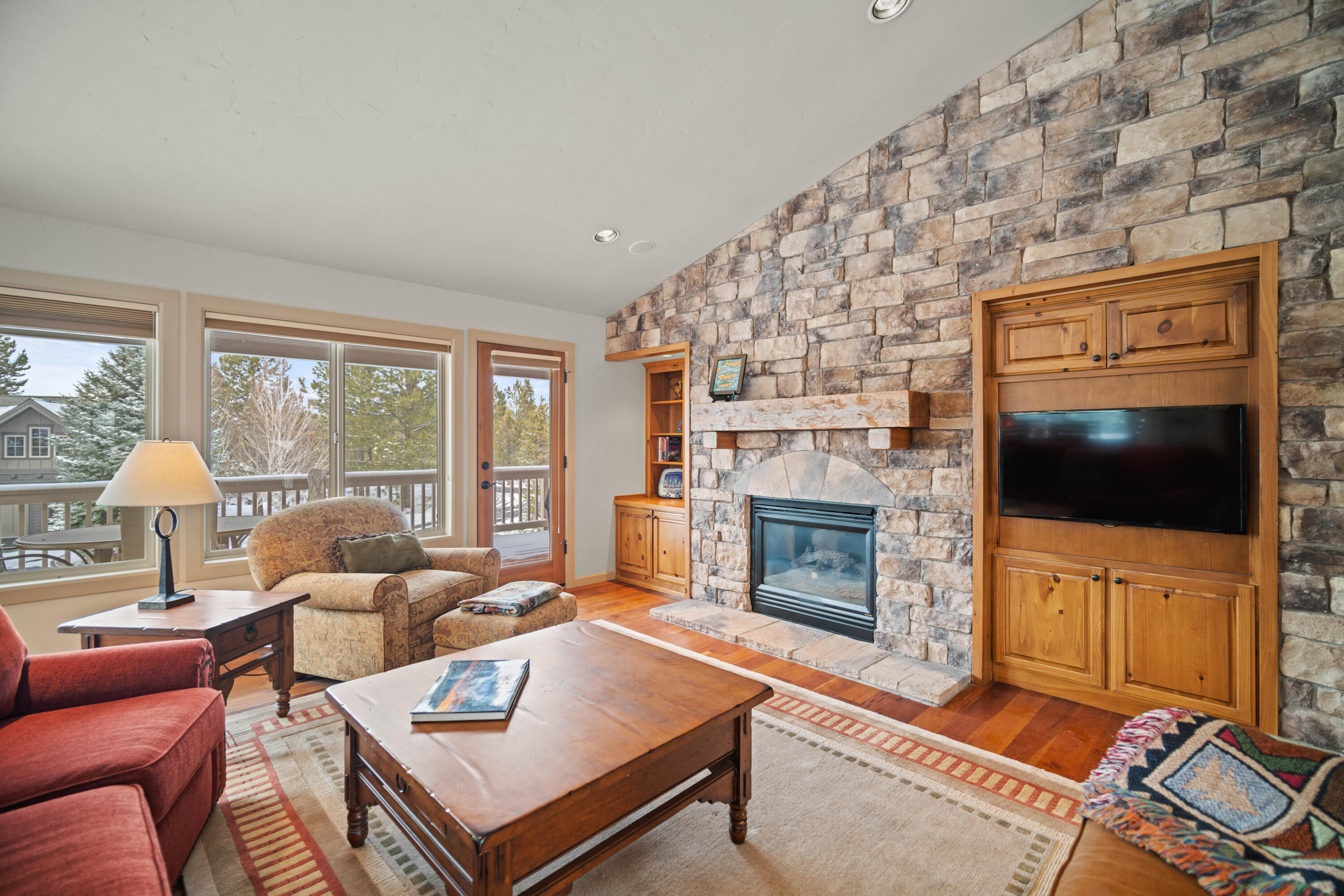 Nestled in the picturesque landscape of Sunriver, this reverse living home captures the essence of resort living with westerly views of Sunriver's Great Meadow and the Cascades. Boasting 2,889 sq. ft, it's in a tranquil, non-rental enclave. Upon entering, you're greeted by soaring high ceilings and a striking floor-to-ceiling fireplace, the focal point of the Great Room. The seamless flow from the Great Room leads to a generously proportioned, partially-covered deck, providing an idyllic setting for outdoor gatherings. Retreat to the primary suite, where indulgence awaits in the form of a spa-like bath, offering a sanctuary for relaxation. The lower level offers additional comfort with a well-appointed suite, guest bedroom, full bath, a spacious bonus room with access to a lower deck, perfect for versatile living options, a convenient utility/mud room, and a coveted 3-car garage, providing ample storage and parking space. The home sits upon a .29-acre lot with mature Aspen trees.