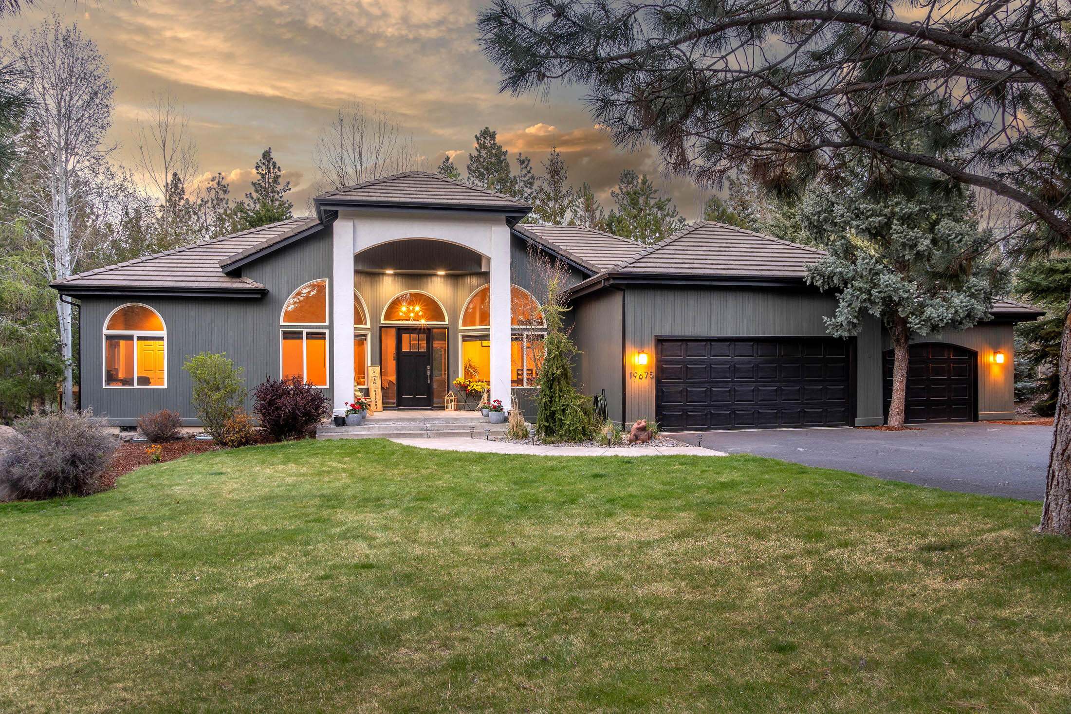 This beautiful Mountain Gate home is privately situated on a quiet cul-de-sac on Bend's westside with easy access to the Deschutes River Trail, Haul Road and Mt. Bachelor. Single level, new exterior/interior paint, newly remodeled kitchen including quartz countertops and a newly remodeled guest bathroom. Positioned to welcome natural light with plenty of large windows and high ceilings. The primary bedroom has its own access to the hot tub and separation from the other 3 bedrooms. Open living space which leads out to an extensive deck for enjoying outdoor living and entertainment! Tons of mature trees and pristine landscaped yard including an enclosed raised garden bed complete with crushed granite and flagstone. New furnace and A/C added in 2019, new dishwasher and stackable washer/dryer added in 2021. Minutes away from the Old Mill District, this home is truly one of a kind! Don't miss out, schedule your tour today!