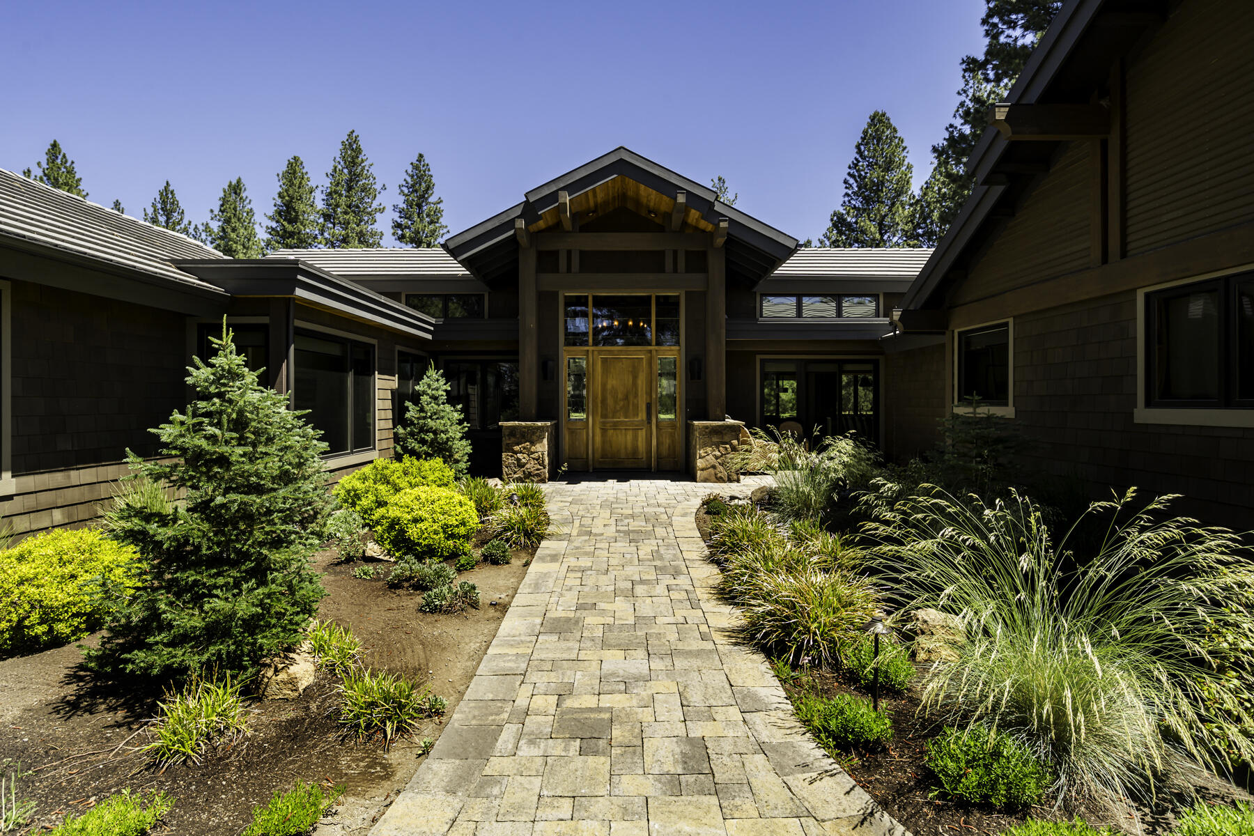 Discover the essence of luxury in Broken Top, a private gated community in Bend. This 3,238 sq ft single-story home on a 0.51-acre lot overlooks the 4th hole of Broken
Top Golf Course. Built in 2017 by Norman Building & Design, the casual elegance design features 3 bedrooms, 3 full baths, 2 half-baths, wide-plank white stained oak
floors, beamed ceilings, & woodclad windows. High-quality custom cabinets, hardware, millwork, & tile throughout. Includes a natural stone gas fireplace. Chef's kitchen
boasts Thermador appliances, oversized gas cooktop, island, & wine bar. Enjoy the partially covered landscaped patio with pavers, fire pit, & serene views. 3-car oversized
garage with epoxy-coated floor. Community amenities include a clubhouse, fitness center, pool & more. This upscale oasis is located just minutes from world-class
outdoor recreation and fine dining.Broken Top Golf Club & social membership is available for homeowners. Sale includes furnishings, household items, & g-carts
