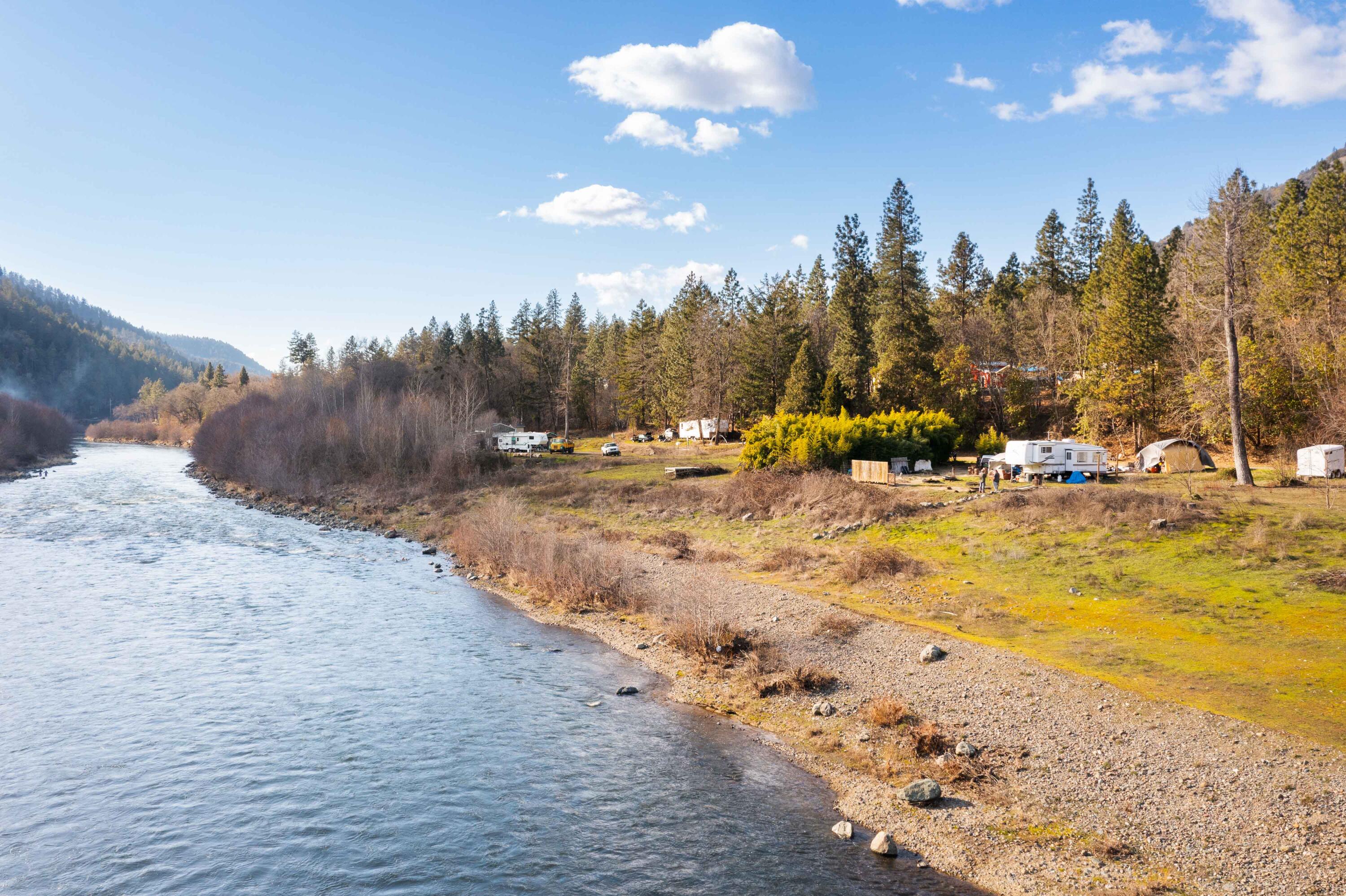 Want to have a piece of the beautiful Rogue River to call your own at a great price? This rare recreational lot on the Rogue River is .40 of an acre and has electricity on the property. The lot is divided by the railroad tracks which gives you an area on the river and an area above on the hill which provides great views. What a great spot to bring your RV , camper, or tent  for a fun retreat. Don't miss out on this opportunity. Call for your showing. Anyone considering purchasing this property should perform their own investigation into the uses and condition of the property. Buyer to do their own due diligence.