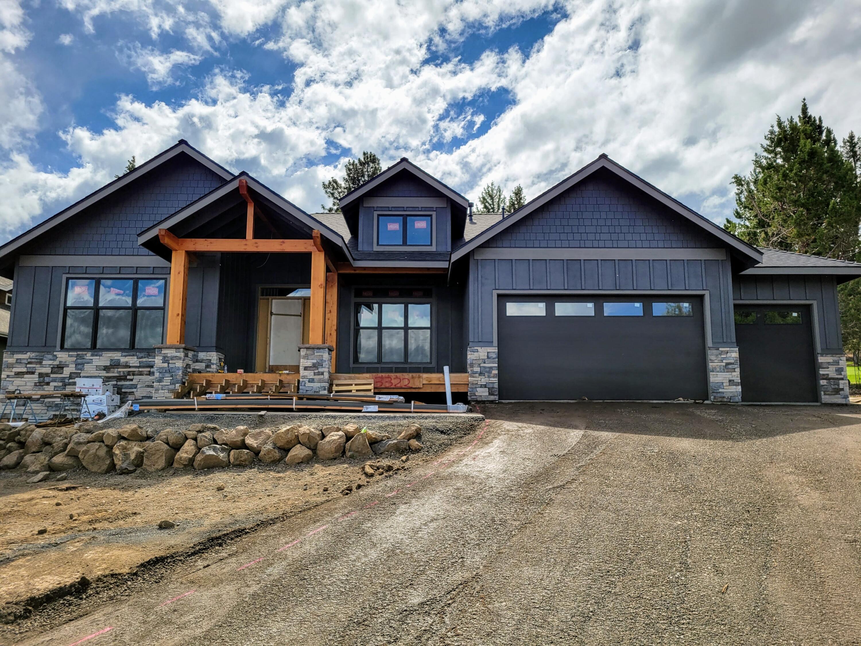 Fabulous Nw Bend home in coveted River's Edge Village golf community. You're going to love this stunning one level Alan Mascord plan. Massive timber framed entry, soaring vaults, hand troweled drywall, Alder Cabinets with solid quartz counters.  Gourmet Kitchen affords the Cafe line GE appliances. Cozy gas log fireplace wrapped in 4' tile and solid black walnut mantle. Low voltage Cat 5 and speaker wiring. Come see this luxurious golf course home uniquely positioned with Easterly City views from the front deck and the tranquility of the 17th fairway from the back patio. Close to miles of walking trails, Sawyer park and the Deschutes River. High efficiency Gas Furnace and A.C. 3 Bedrooms + Den. 759 sf 3 car garage, pre wired for electric vehicle. Keep an eye out for additional photos to be added as finish work is completed you're going to be wowed!