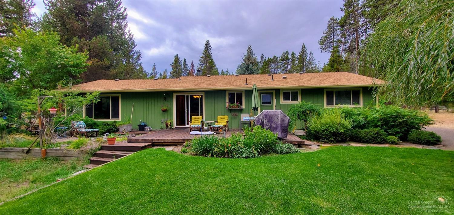Owner says Lets Sell This Property Drastic price reduction for a quick sale. Imagine yourself here by the holidays. A place to call home with a view of Paulina Peak out your back door. This comfortable 2 bedroom, 2 bath has 1604 sq. ft. with a family room and living room. There is a guest house in the back yard that could be converted back to a garage very easily, this could be a nice hobby room, office or just a place to get away. There are 2 storage sheds out back. The yard makes you feel like you are living in a park setting with views and privacy. This home is located on a paved street, has a circular driveway, and just minutes to downtown La Pine.