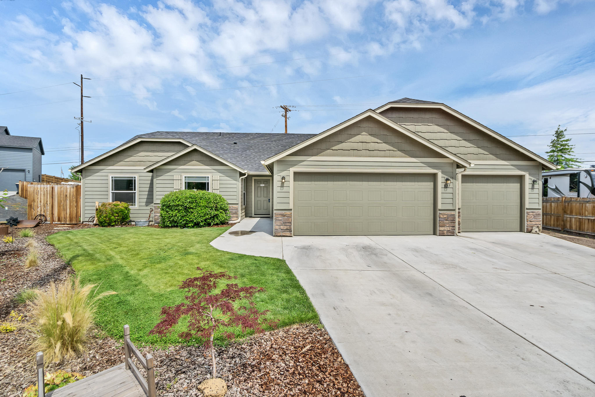 Lovely air conditioned single level ranch with a large open concept great room, cathedral ceilings and gas fireplace provides a warm comfortable ambiance, large kitchen and dining areas, 3 bedrooms, 2 bath and a full size office/den. The covered patio off the dining area is great for entertaining, barbecuing, and relaxing most of the year. The 790 sq ft oversize three car garage provides lots of extra storage, they also have much desired RV parking with hookups and dump site