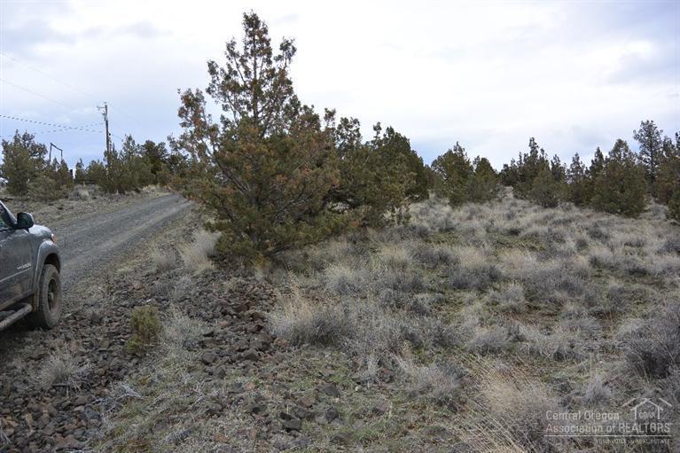 Nice elevated lot located in Prineville Lake Acre neighborhood just a short drive from Prineville Reservoir. Cascade Mountain, Powell Butte & Smith Rock views. Quiet and private end of road location. Lot 1800 across the street is also available.