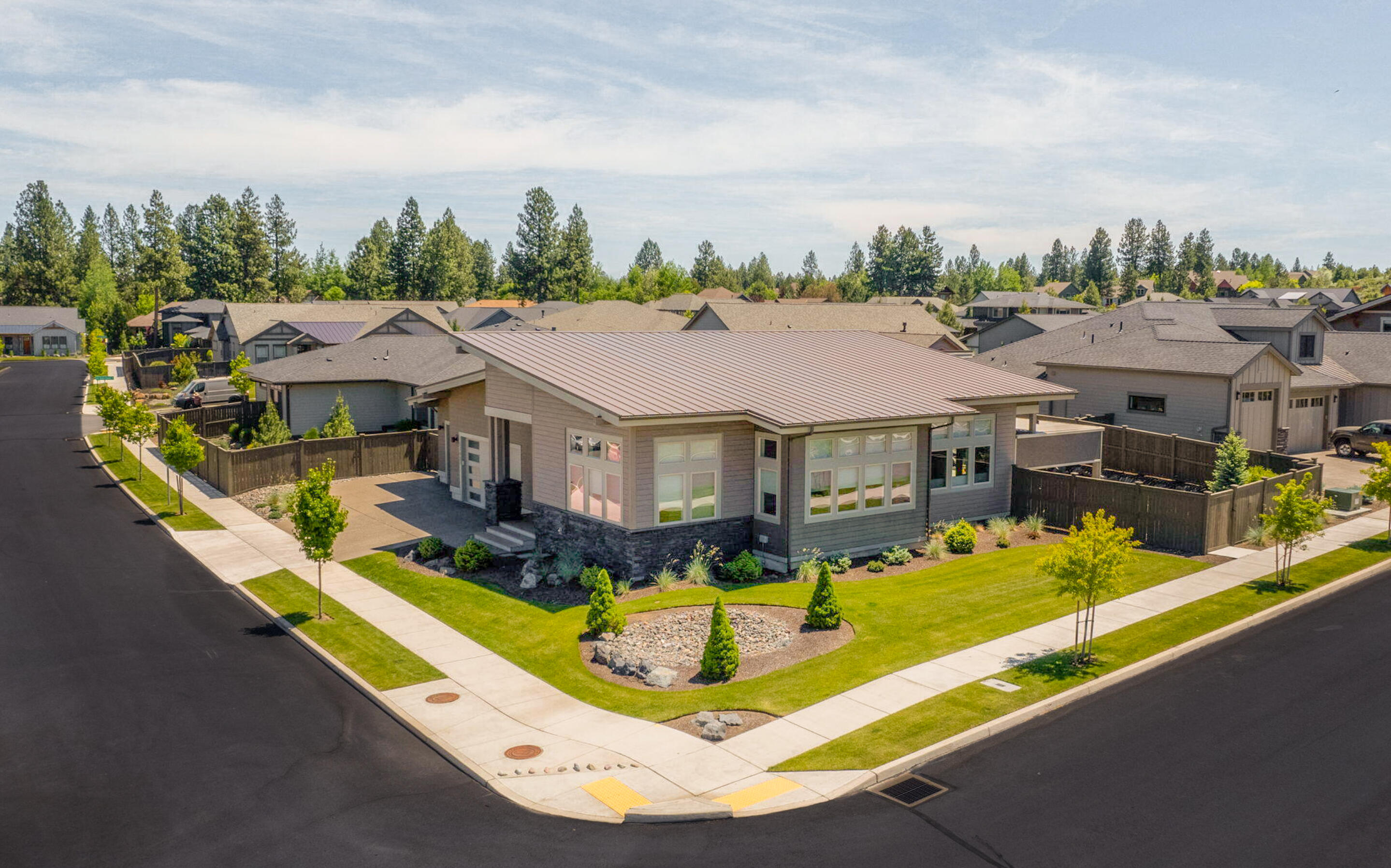 Located in Bend, Oregon's prestigious Rivervale, this exquisite single-level home built in 2019 spans 2,550 sq. ft., featuring three bedrooms, three bathrooms, and a generous three-car garage. Just steps from the Deschutes River, its open floor plan highlights quality flooring throughout, leading to a gourmet kitchen equipped with high-end appliances, ideal for both family meals and large gatherings. The property, on a desirable corner lot, boasts a stunning wraparound yard with ample space for entertainment and includes RV parking, enhancing its appeal for adventure seekers. With close proximity to parks, trails, and skiing opportunities, it offers a luxurious living experience in a sought-after Bend neighborhood.
